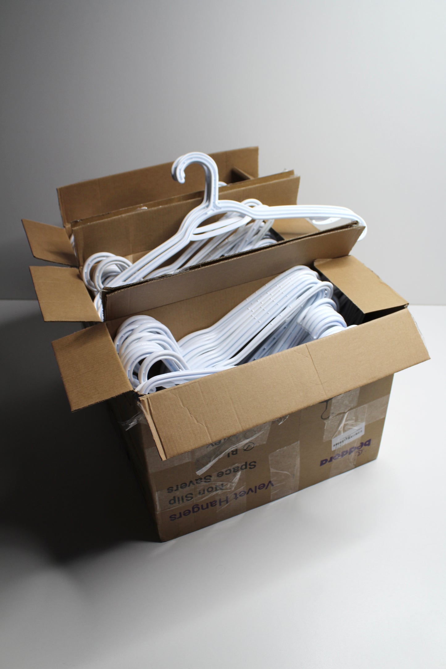 Set of 90 slim neat freak white plastic clothes hangers