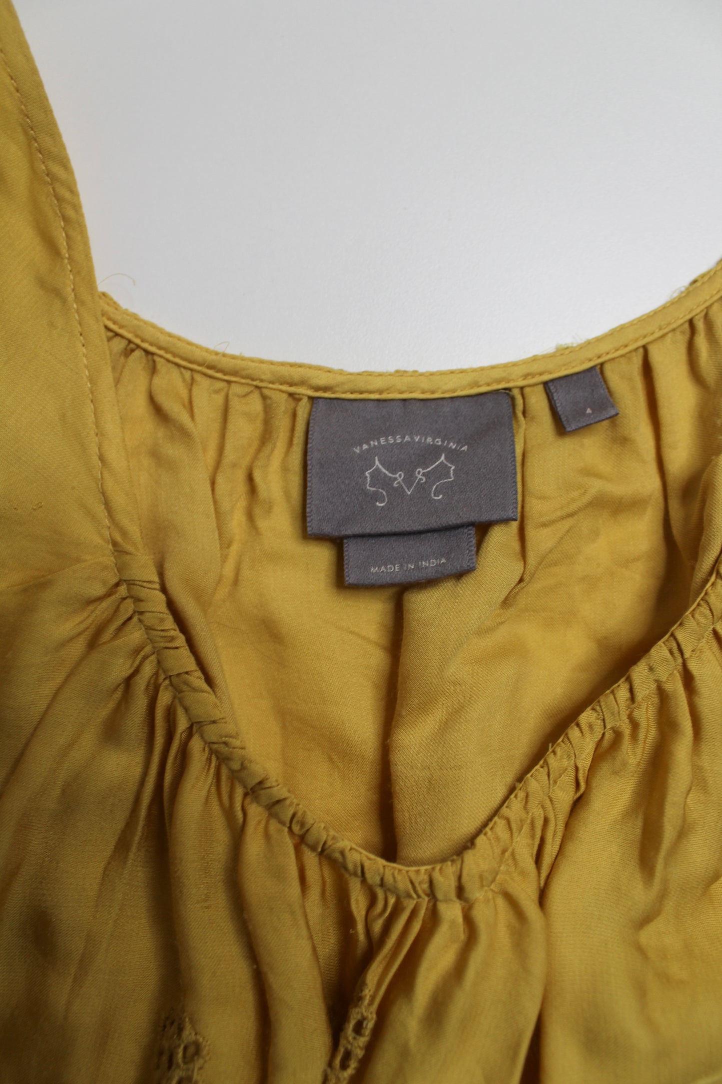 Anthropologie Vanessa Virginia mustard yellow sleeveless eyelet blouse, size 4