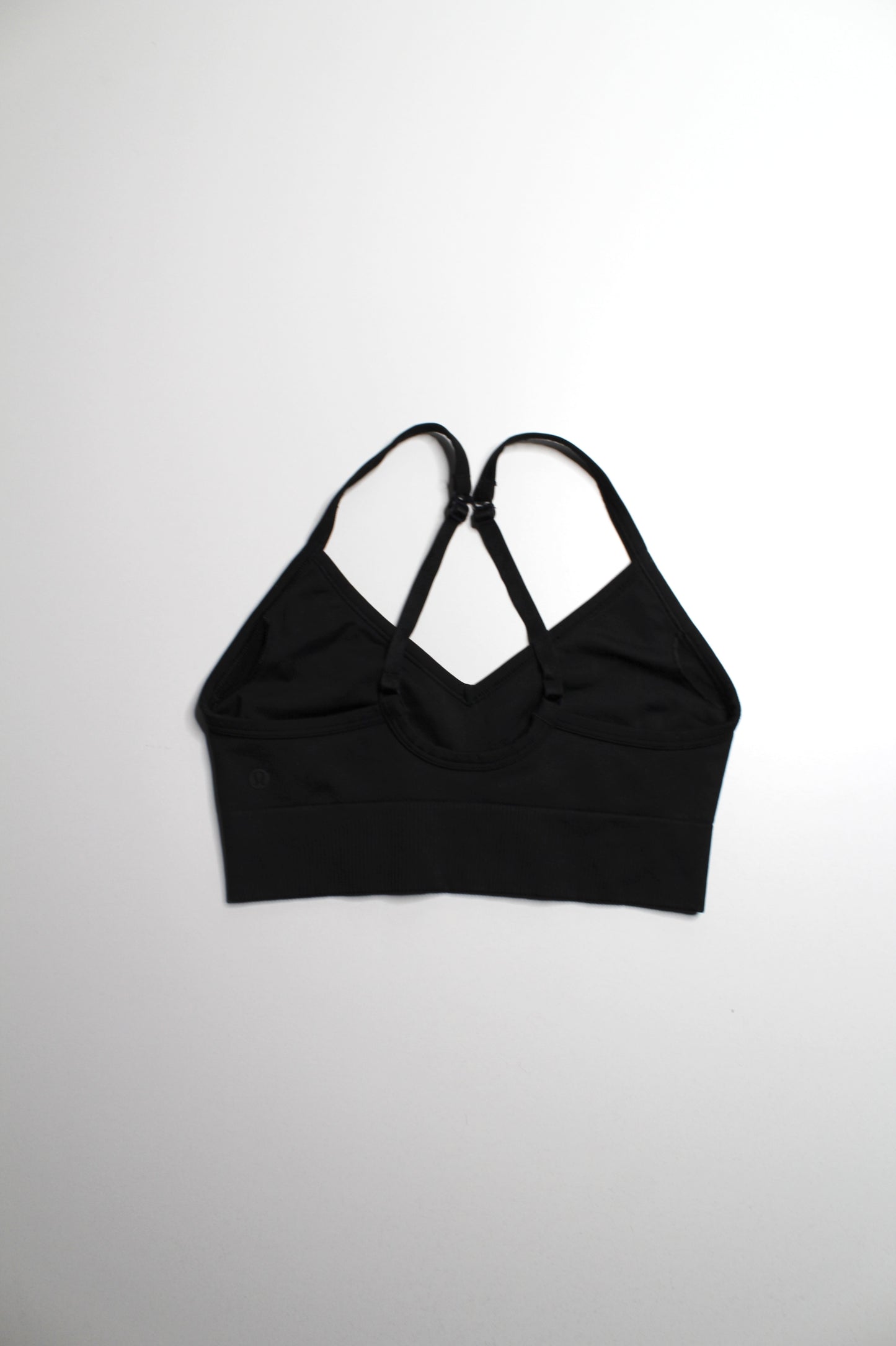 Lululemon black ‘ebb to street’ bra, size 4