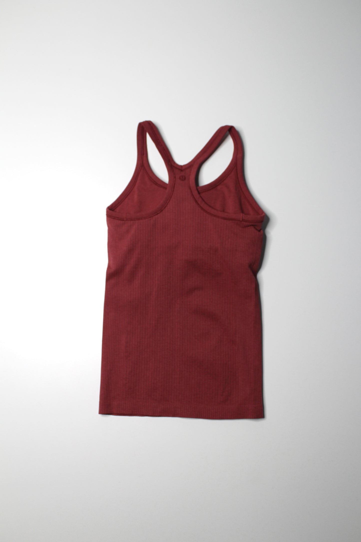 Lululemon cranberry ‘ebb to street’ tank, size 4