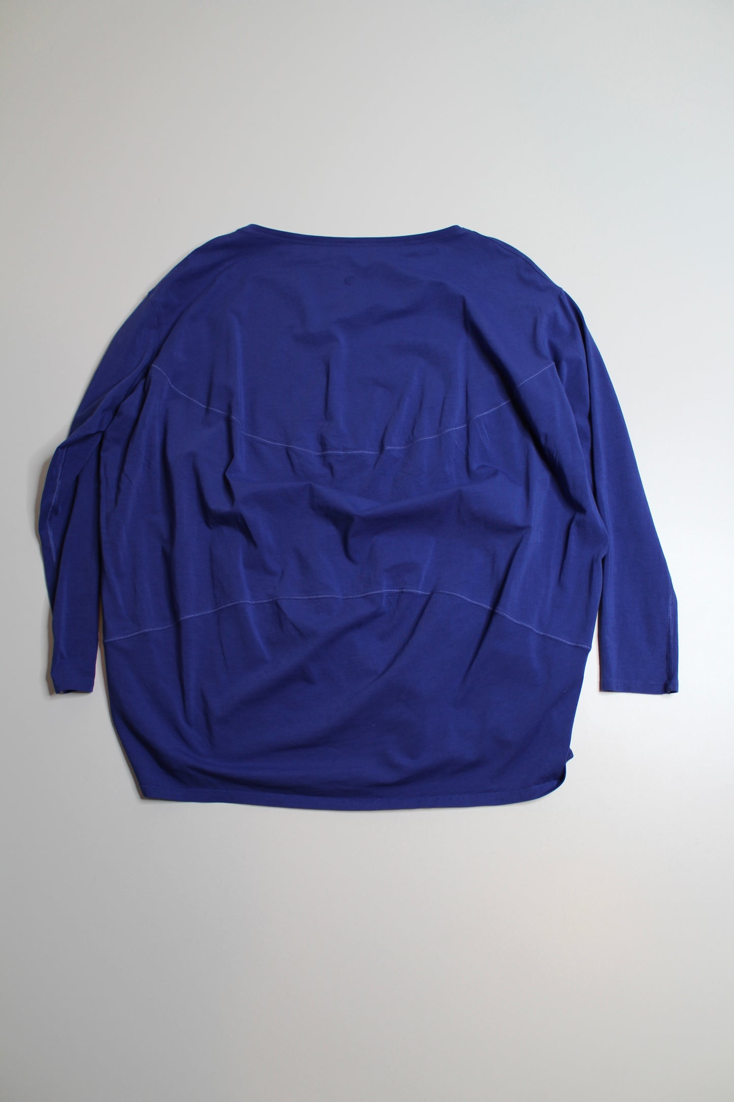 Lululemon blue back in action long sleeve, no size. Fits like size 6 (loose fit) (price reduced: was $36)