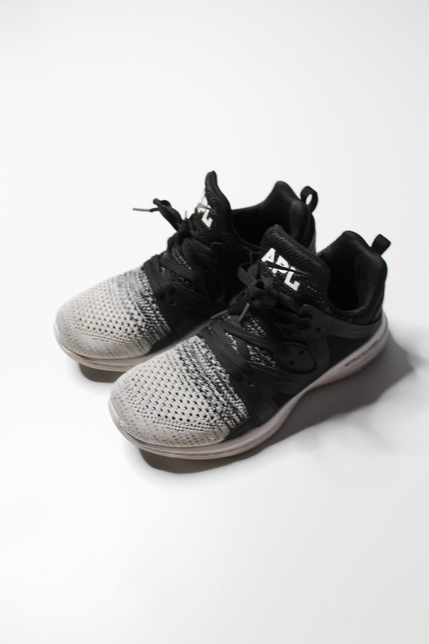 APL (Lululemon) black/white running shoe, size 8 (sale: 10% off)
