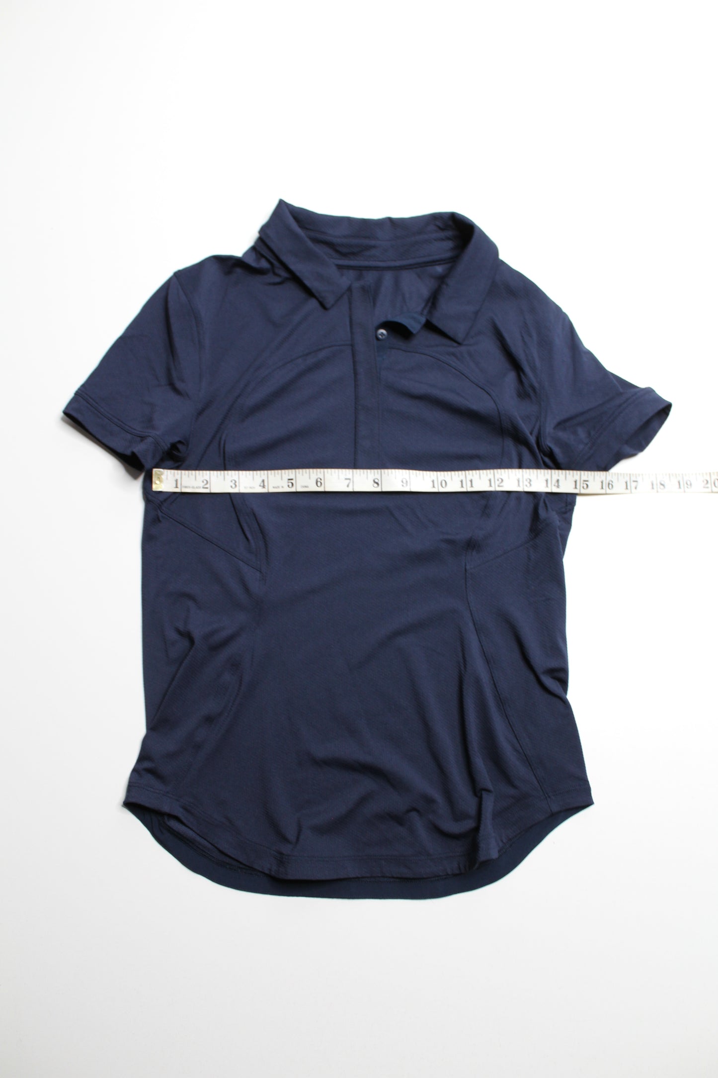 Lululemon true navy shirt sleeve golf polo, size 4 (relaxed fit)