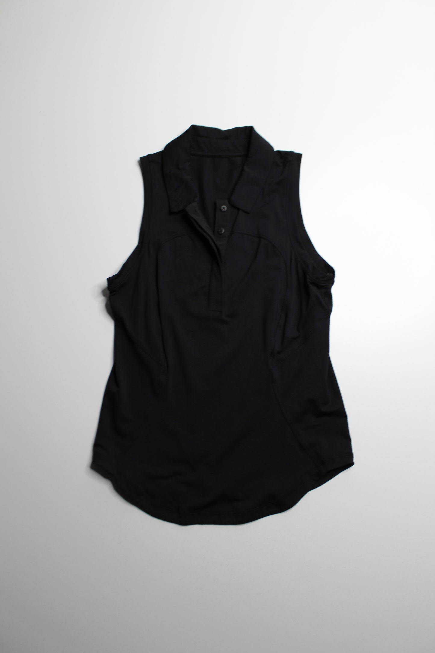 Lululemon black ‘quick dry sleeveless polo' tank, no size. Fits like 4 *curved hem