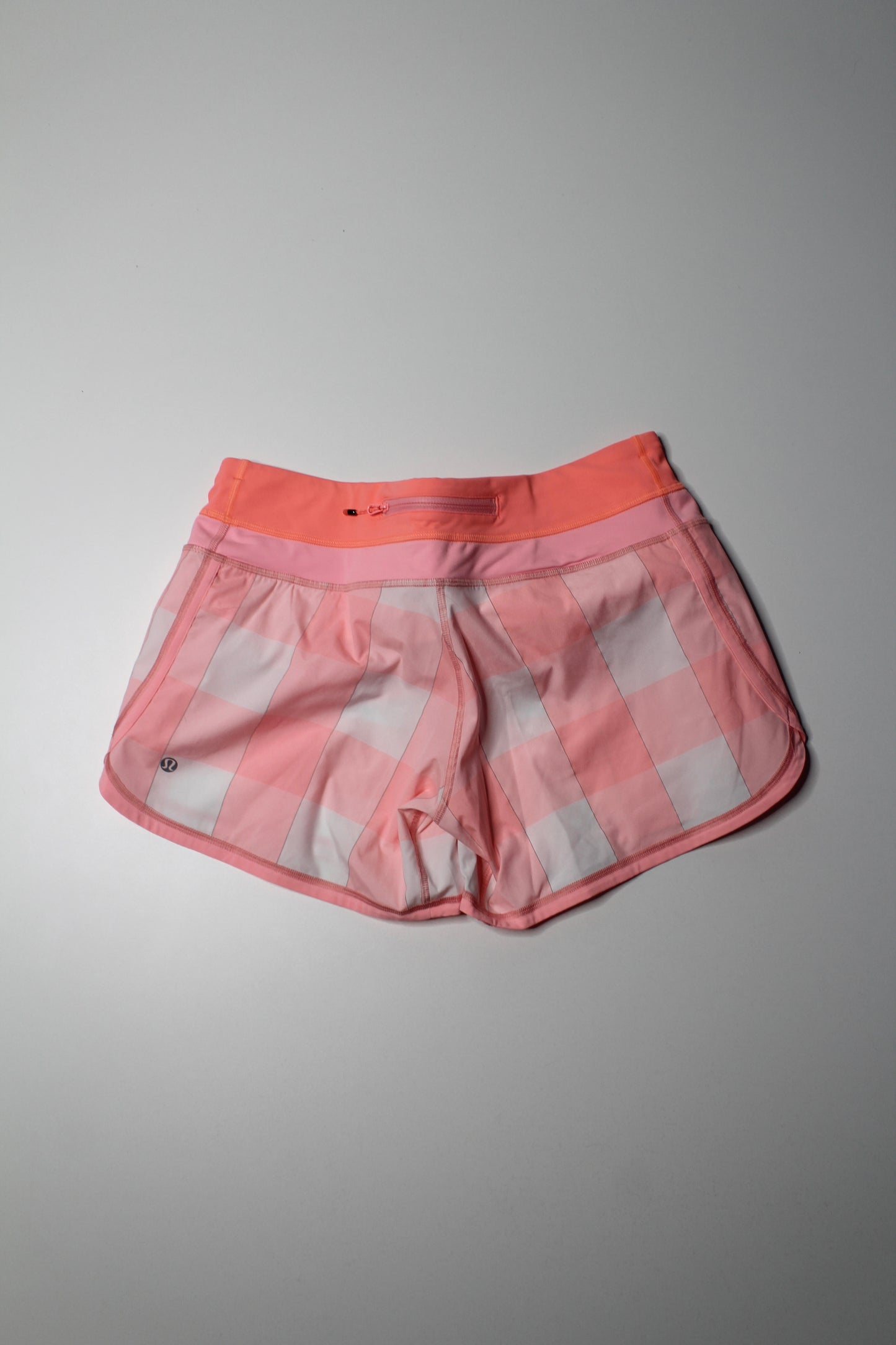 Lululemon bleached coral 'groovy run' shorts, size 6