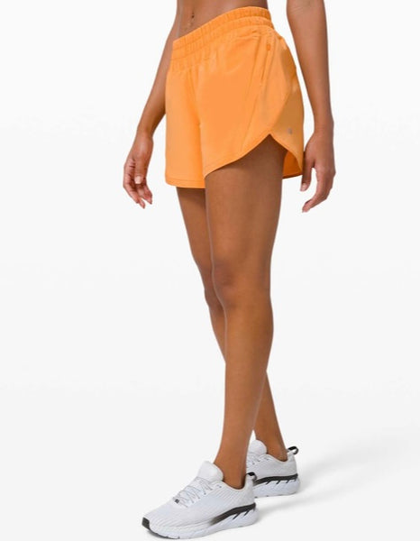 Lululemon monarch orange track that shorts, size 6 (5”) (price reduced: was $35)