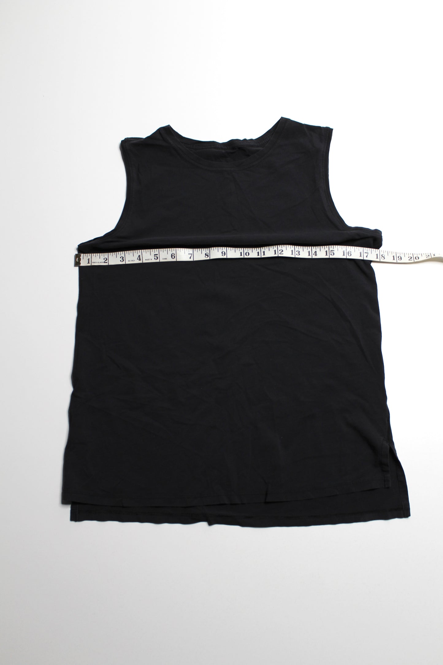 Lululemon black cotton muscle tank, no size. Fits like 8