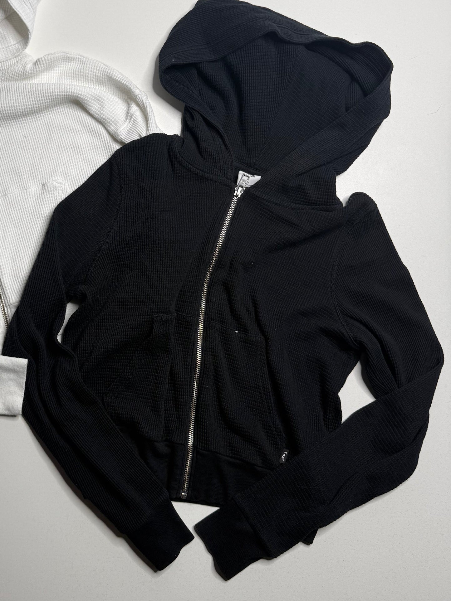Aritzia TNA black waffle zip up hoodie, size small