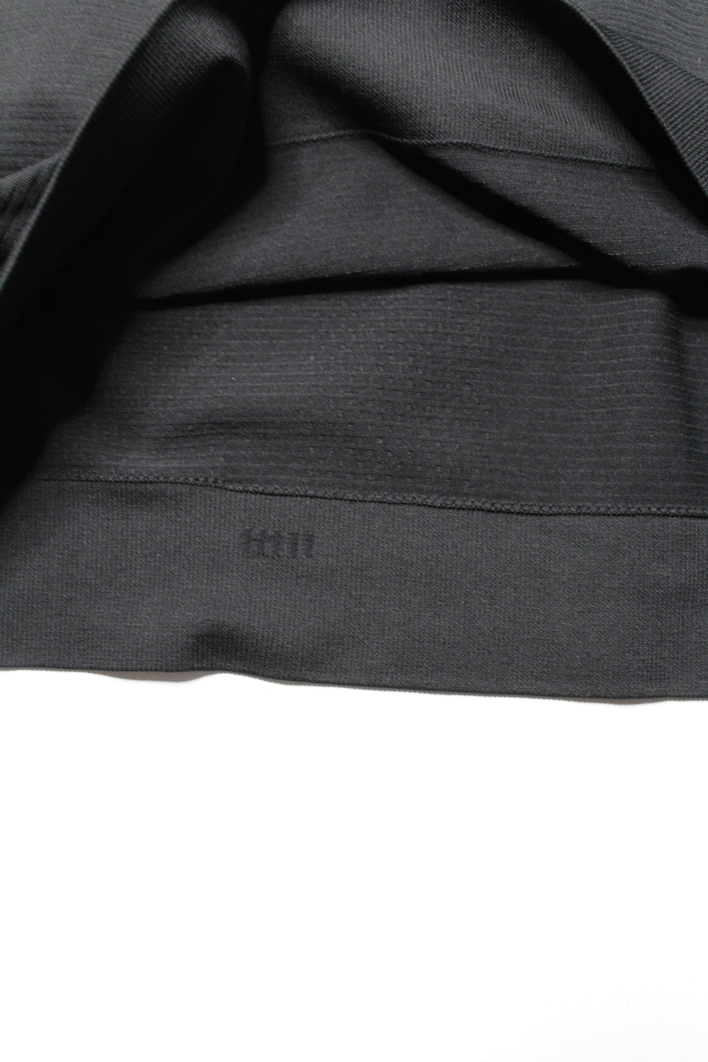 Lululemon black high neck ‘swiftly’  tech tank, no size. Fits like 12 *race length)