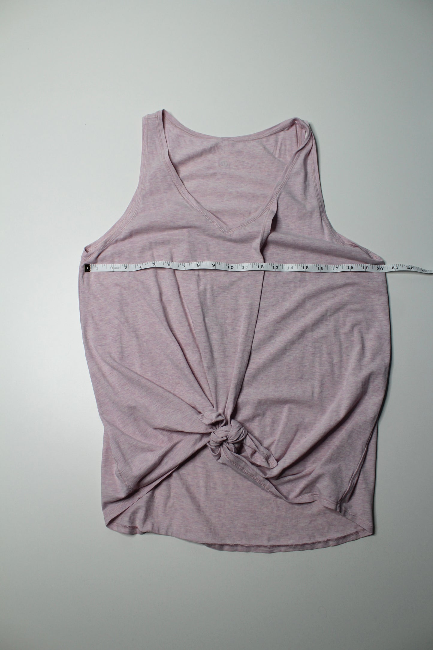 Lululemon heathered pink knot front tank, no size. Fits like 10/12