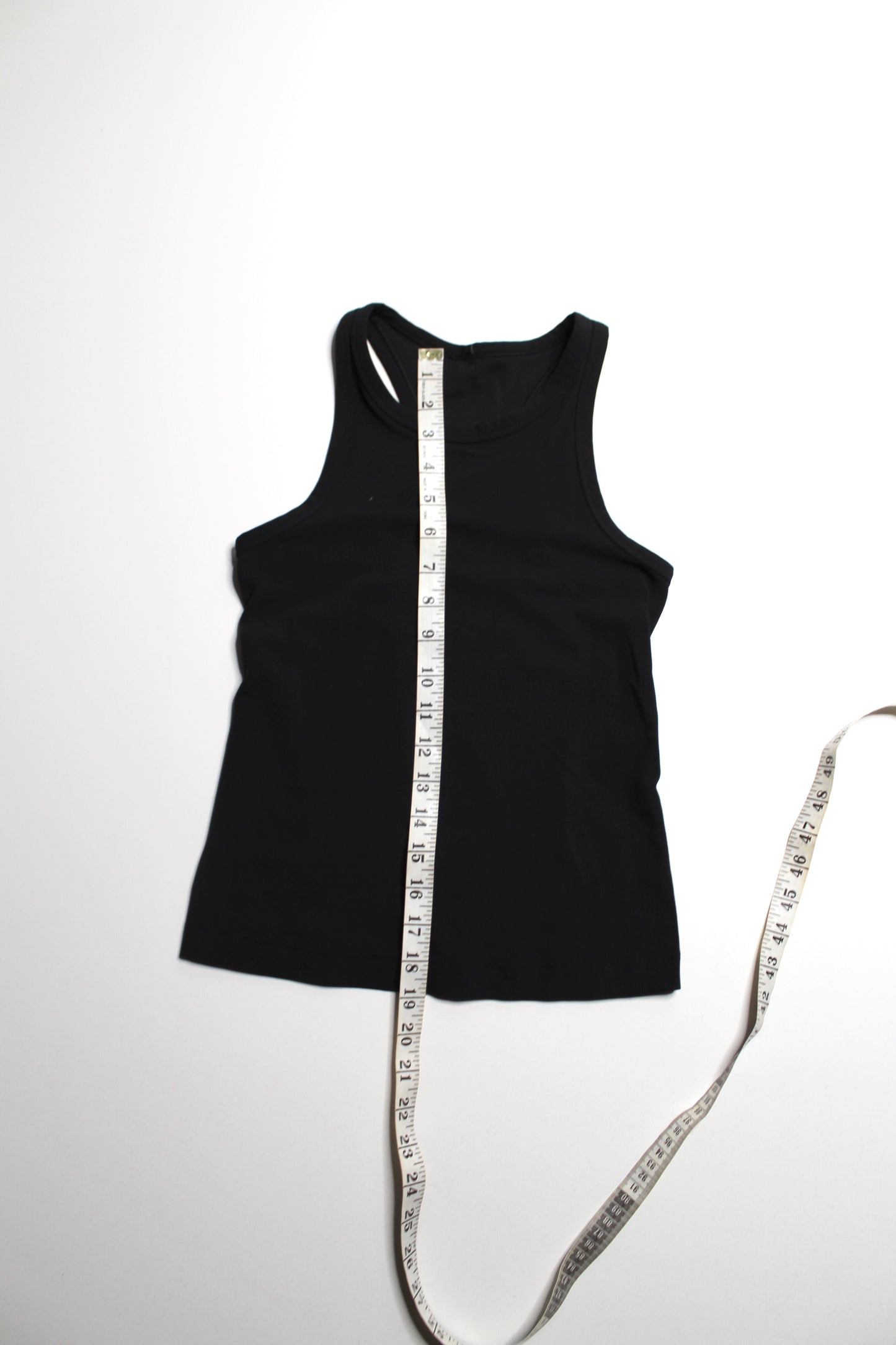 Lululemon black waist length racerback ‘align’ tank, no size. Fits like 4