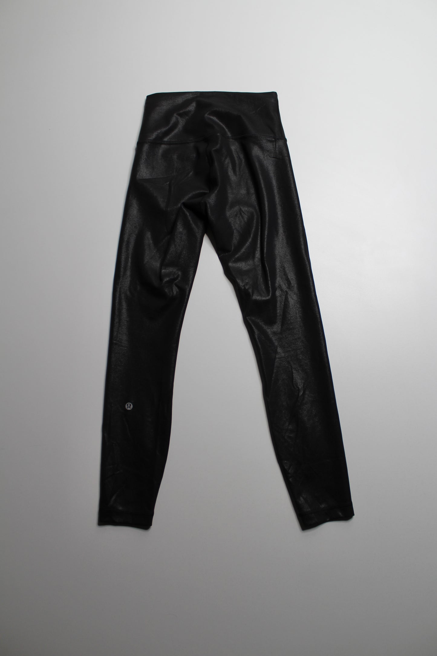 Lululemon black foil ‘wunder train’ tight, size 4 (25")
