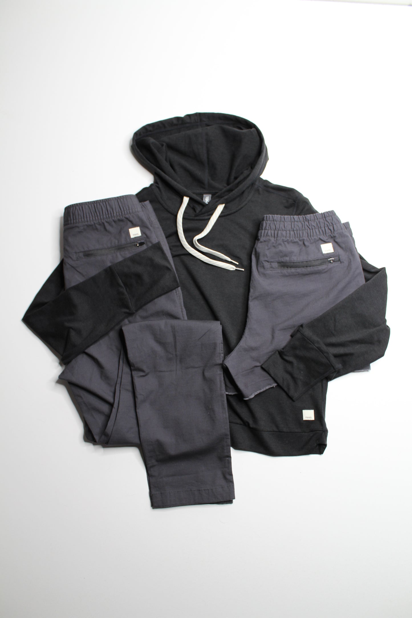 Vuori black pullover hoodie, size small (relaxed fit)