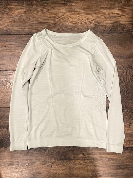 Lululemon light green swiftly breeze long sleeve, no size. Fits 4/6