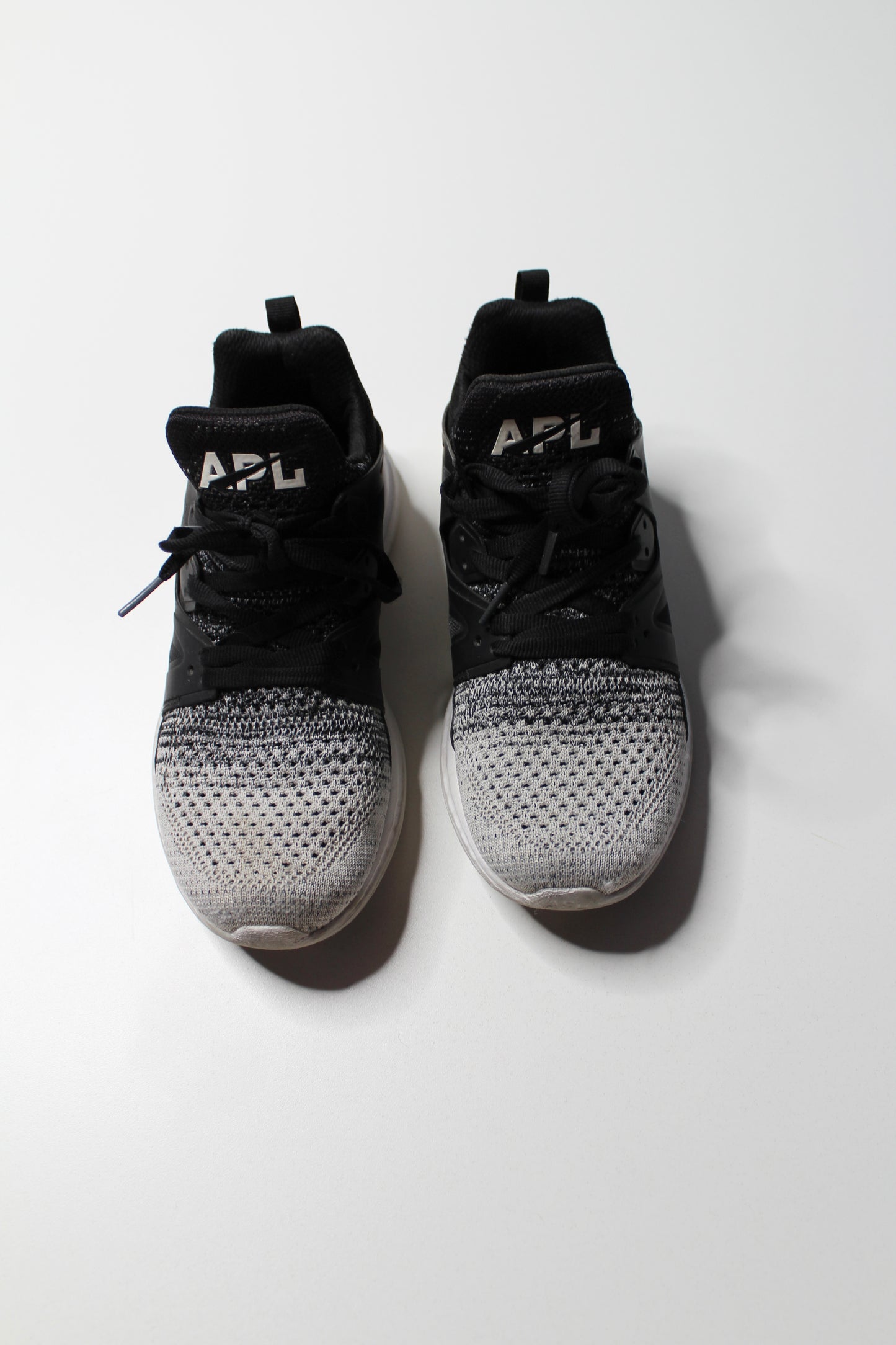 APL (Lululemon) black/white running shoe, size 8 (sale: 10% off)