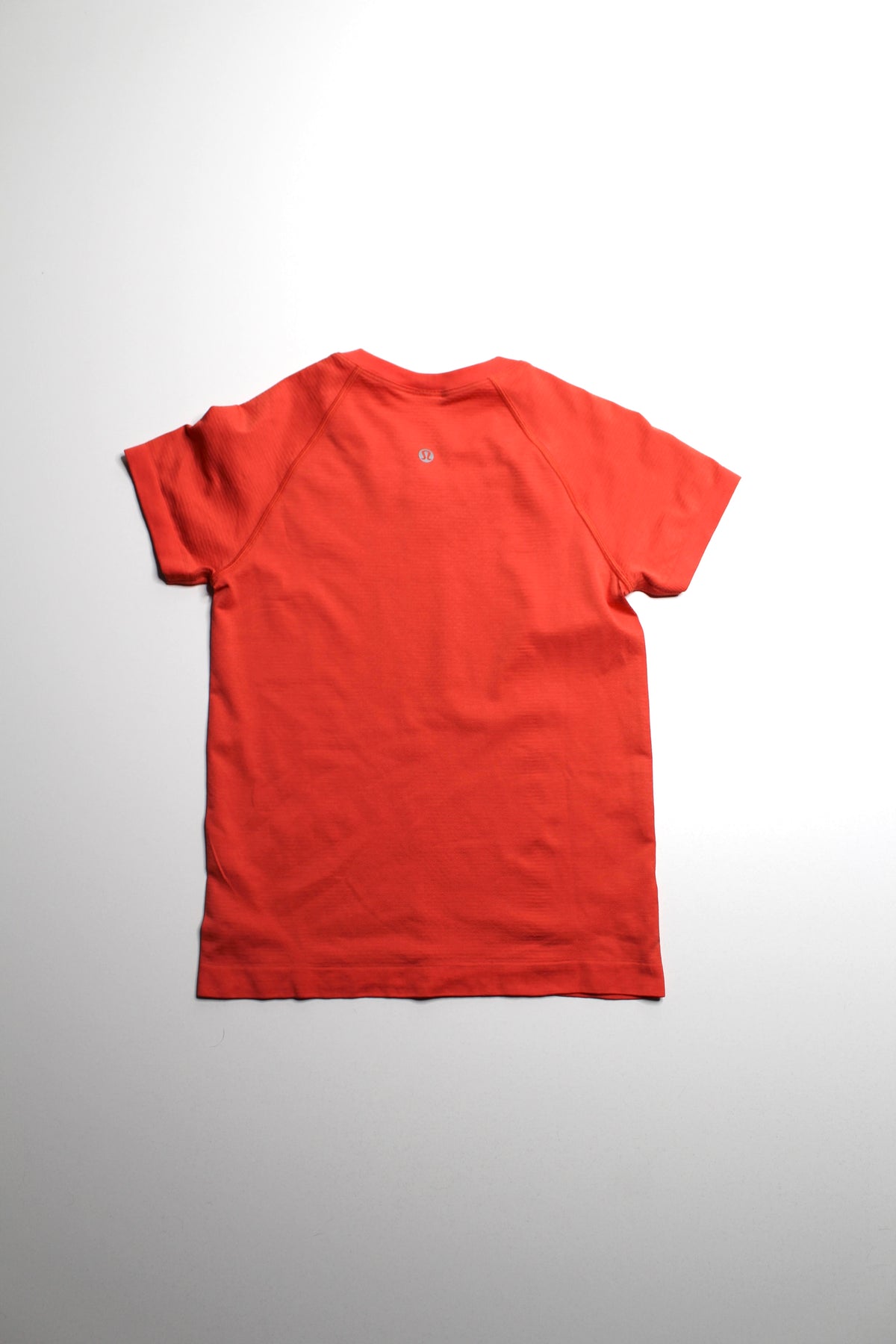 Lululemon orange ‘swiftly tech’ short sleeve, size 4