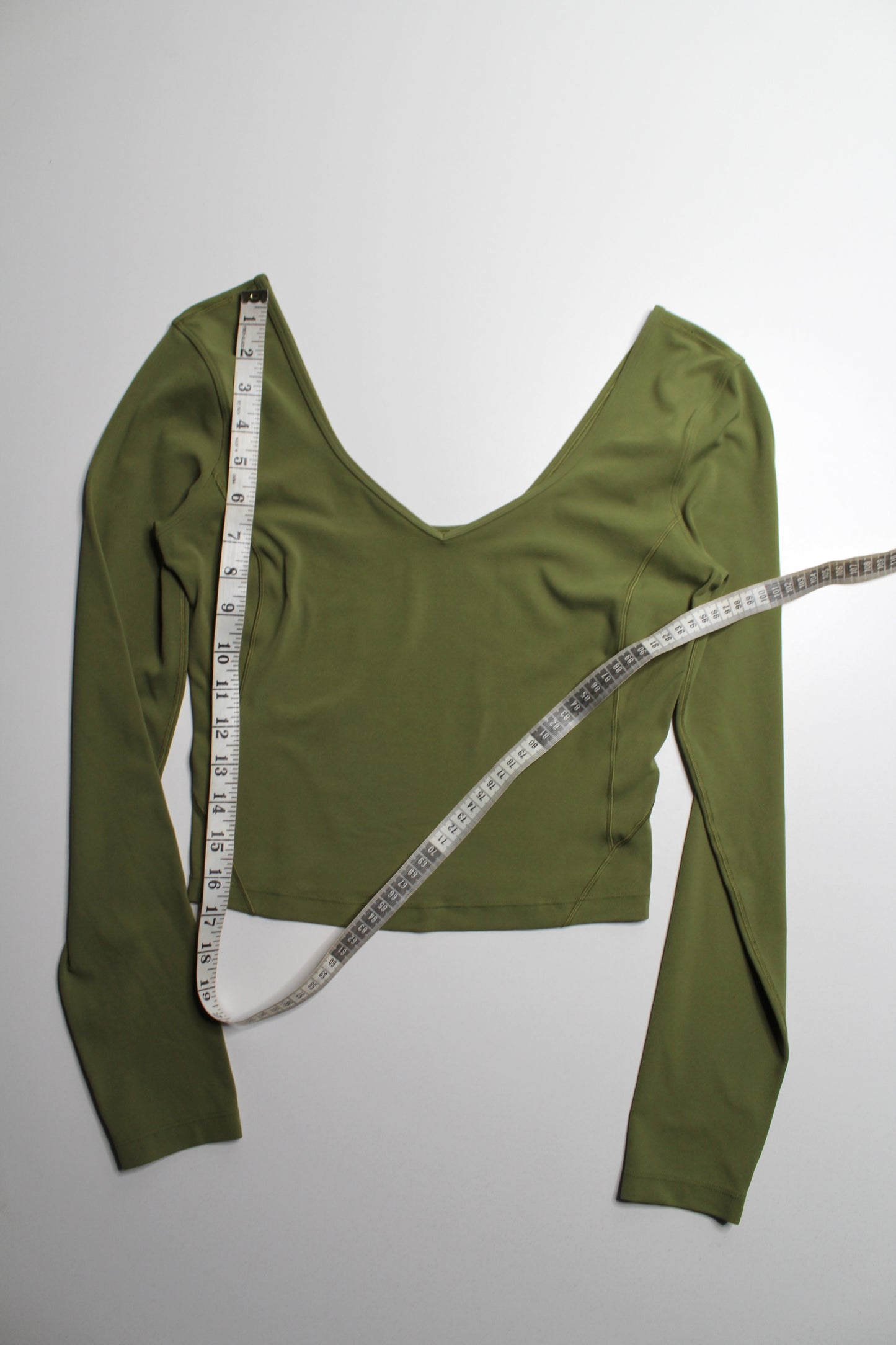 Lululemon bronze green ‘align’ v neck long sleeve, no size. Fits like 6