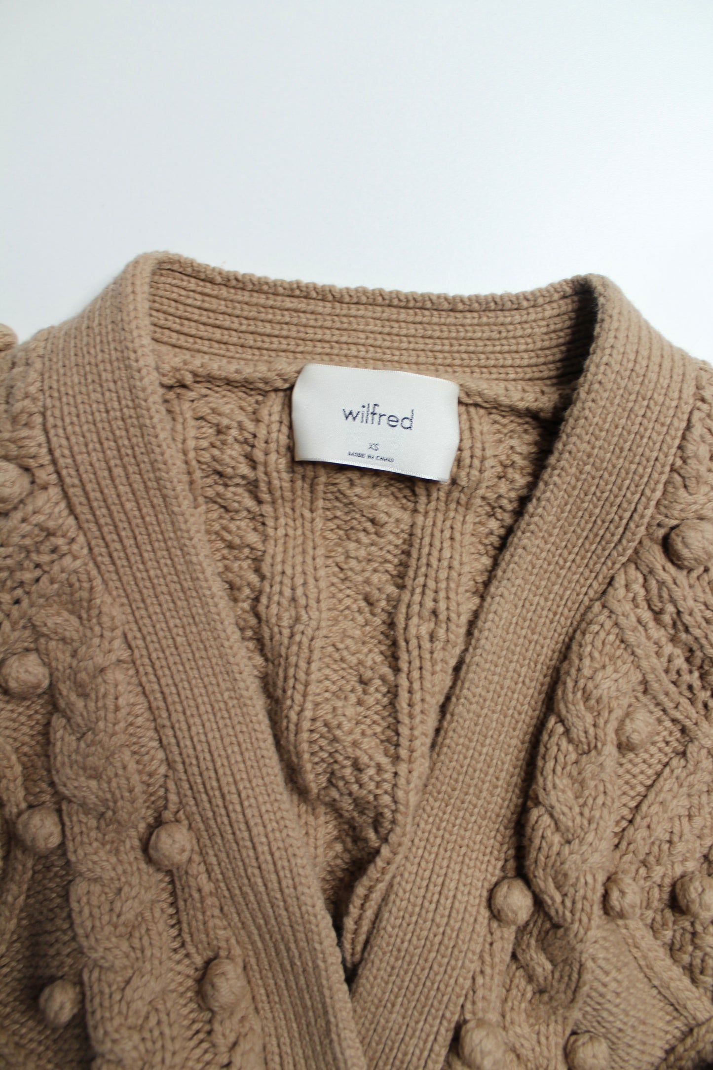 Aritzia Wilfred antique beige ‘alps’ cable knit pom cardigan, size xsmall (oversized fit)