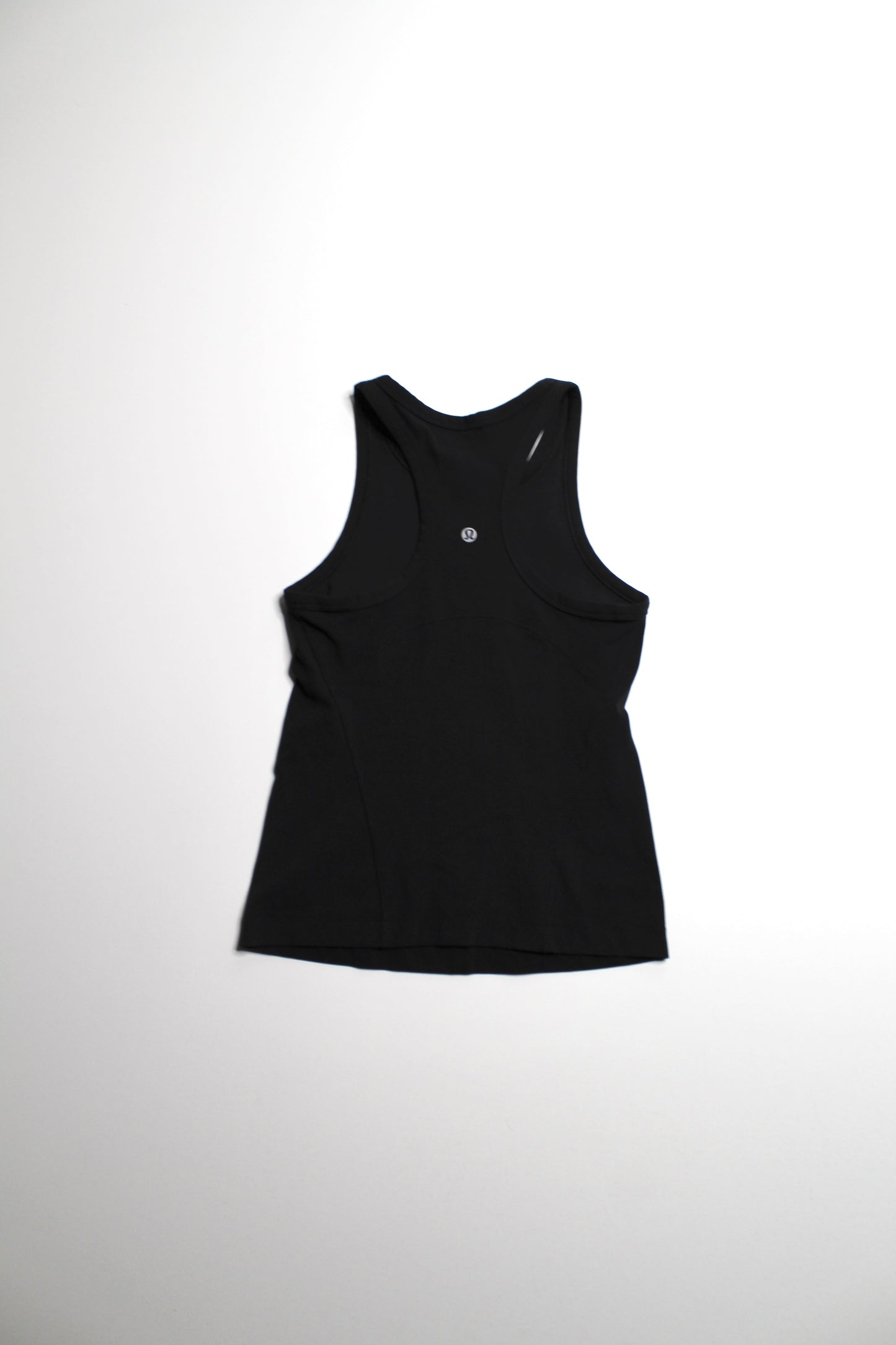 Lululemon black waist length racerback ‘align’ tank, no size. Fits like 4