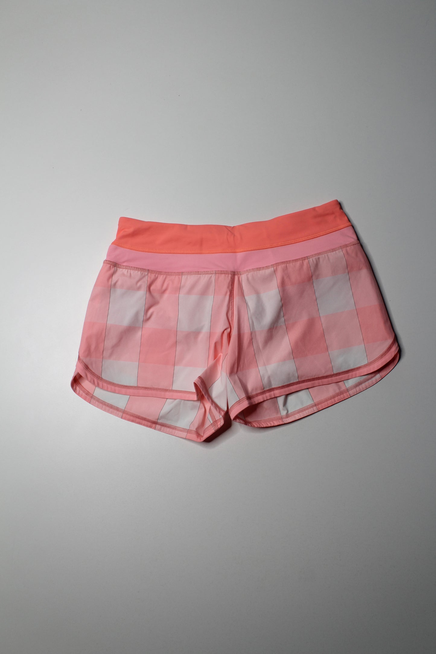 Lululemon bleached coral 'groovy run' shorts, size 6