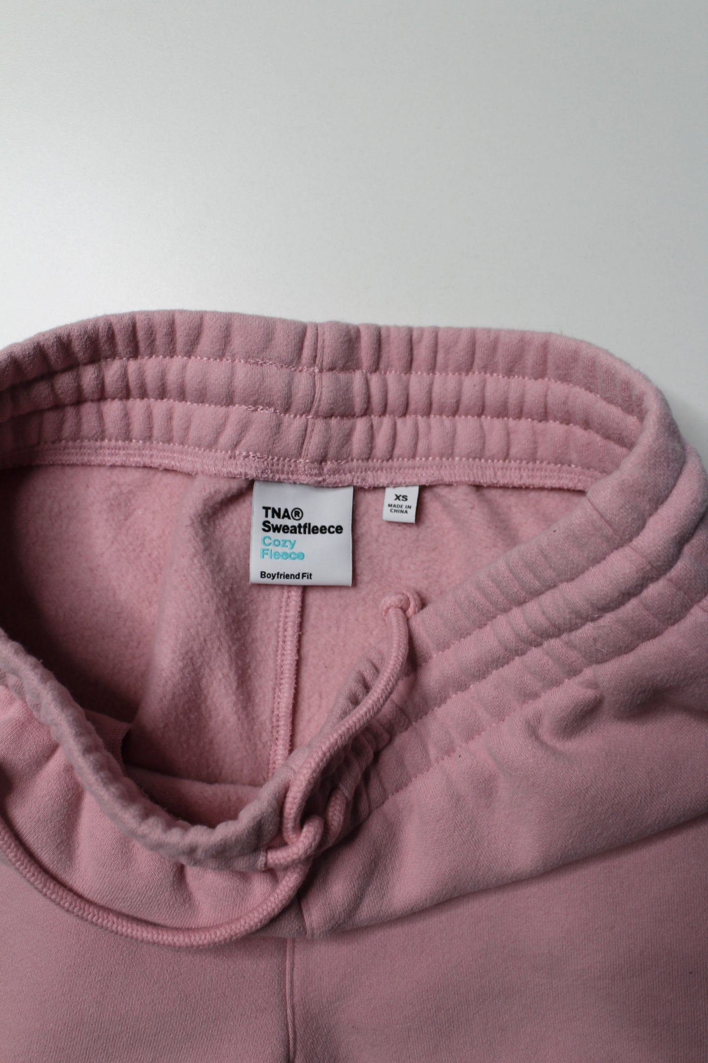 Aritzia TNA pink ‘cozy sweat fleece’ shorts, size xs