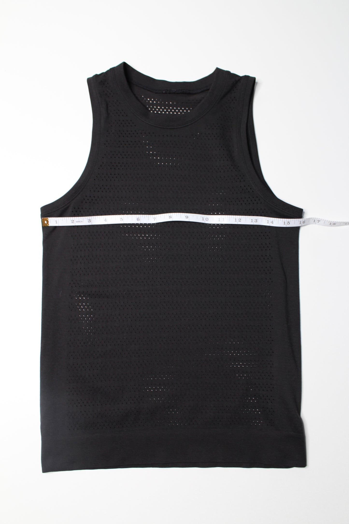 Lululemon black ‘breeze by’ muscle tank, no size. Fits like 4 (relaxed fit)