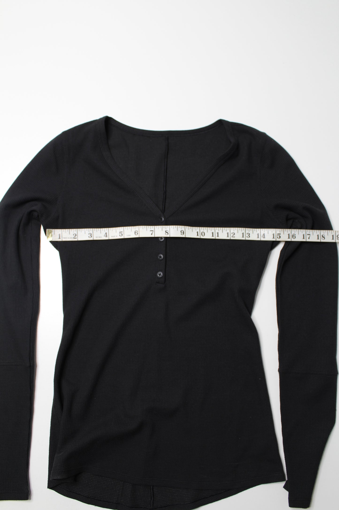 Lululemon black 'close call' henley long sleeve, no size. Fits like size small