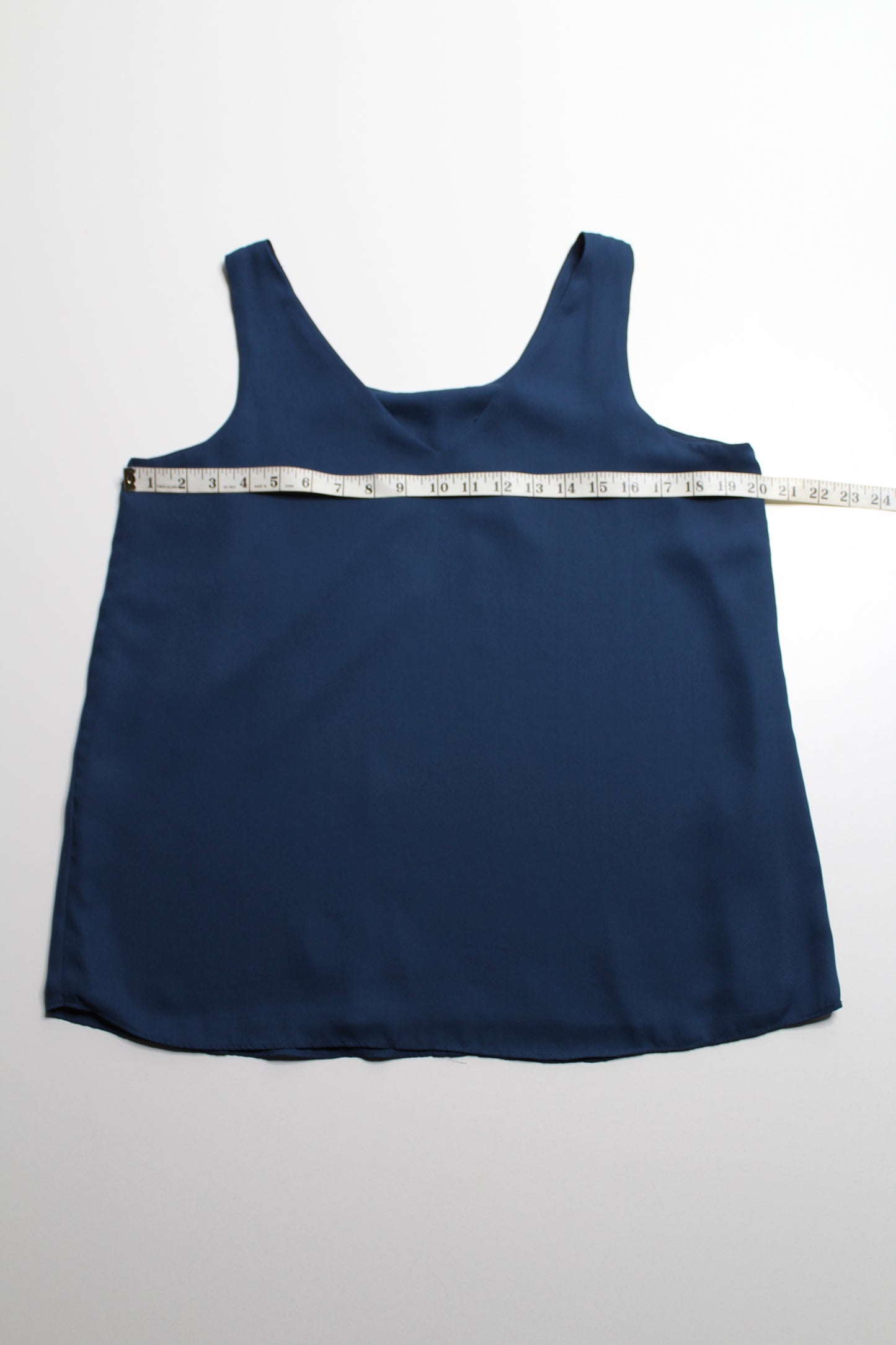 Unknown brand teal sleeveless blouse, no size. fits like large
