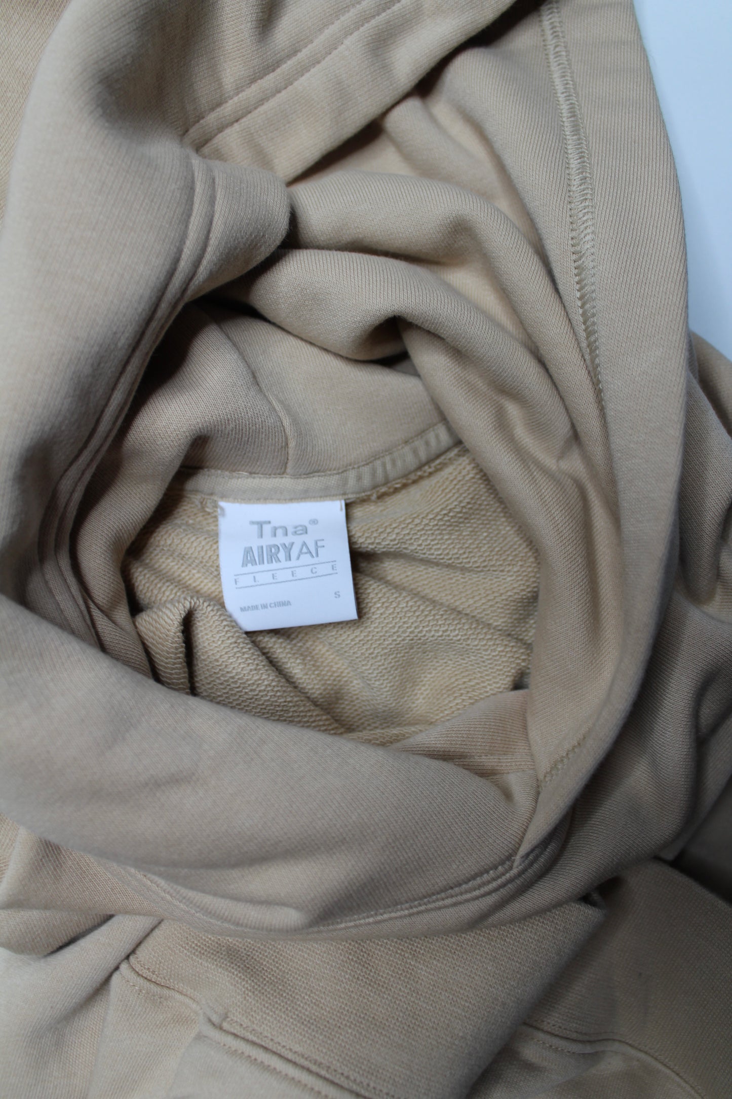 Aritzia TNA ‘AIRY AF’ gold hoodie, size small (relaxed fit)