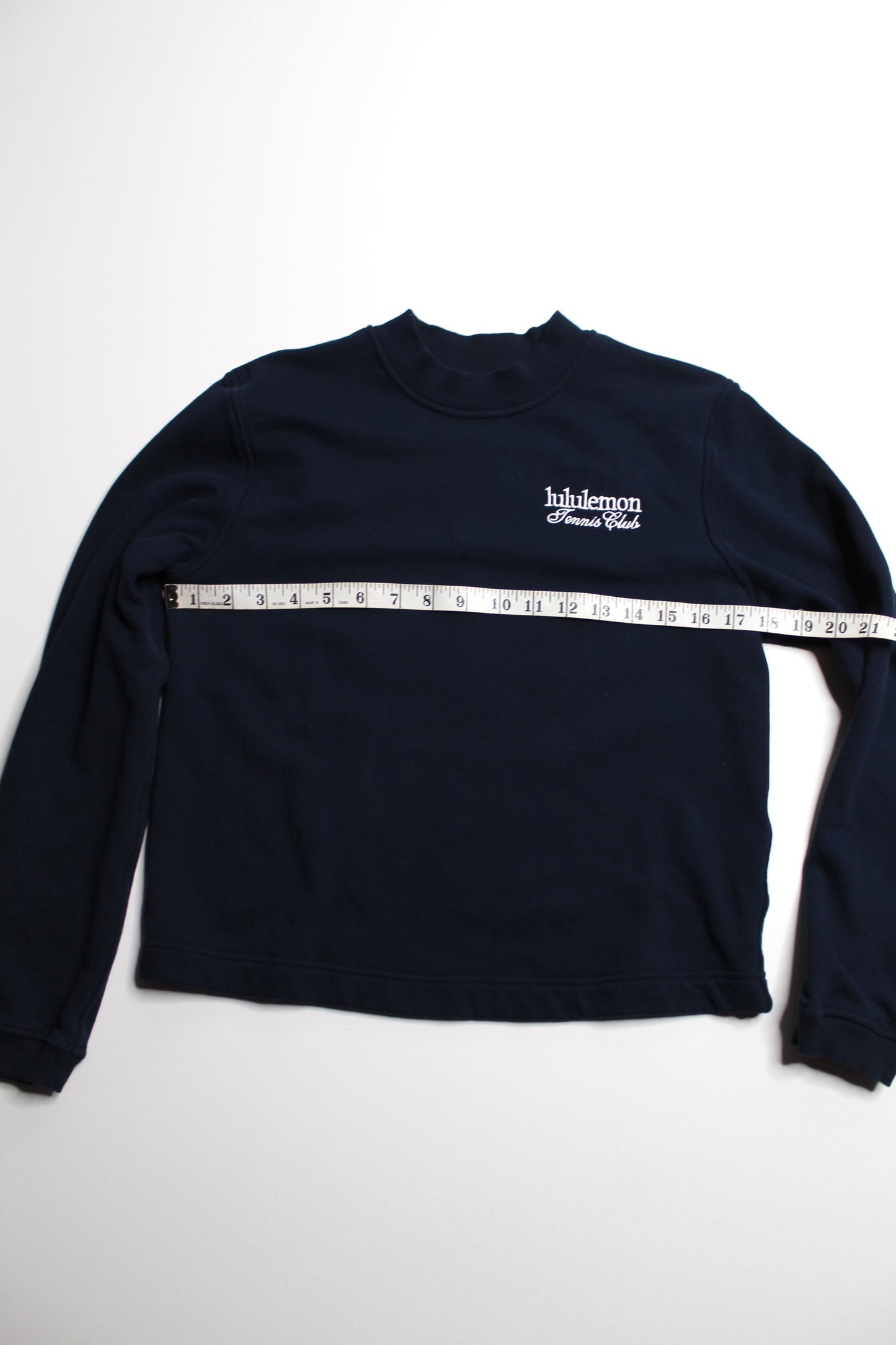 Lululemon navy ‘tennis club’ sweatshirt, no size. Fits like 6 (or size small)