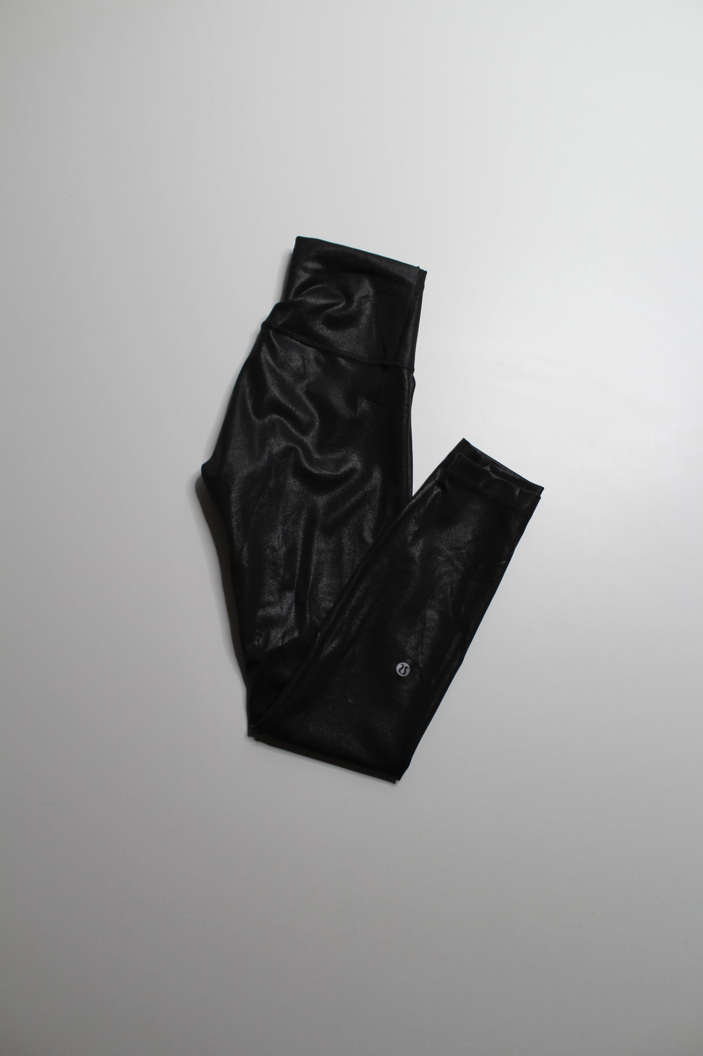 Lululemon black foil ‘wunder train’ tight, size 4 (25")