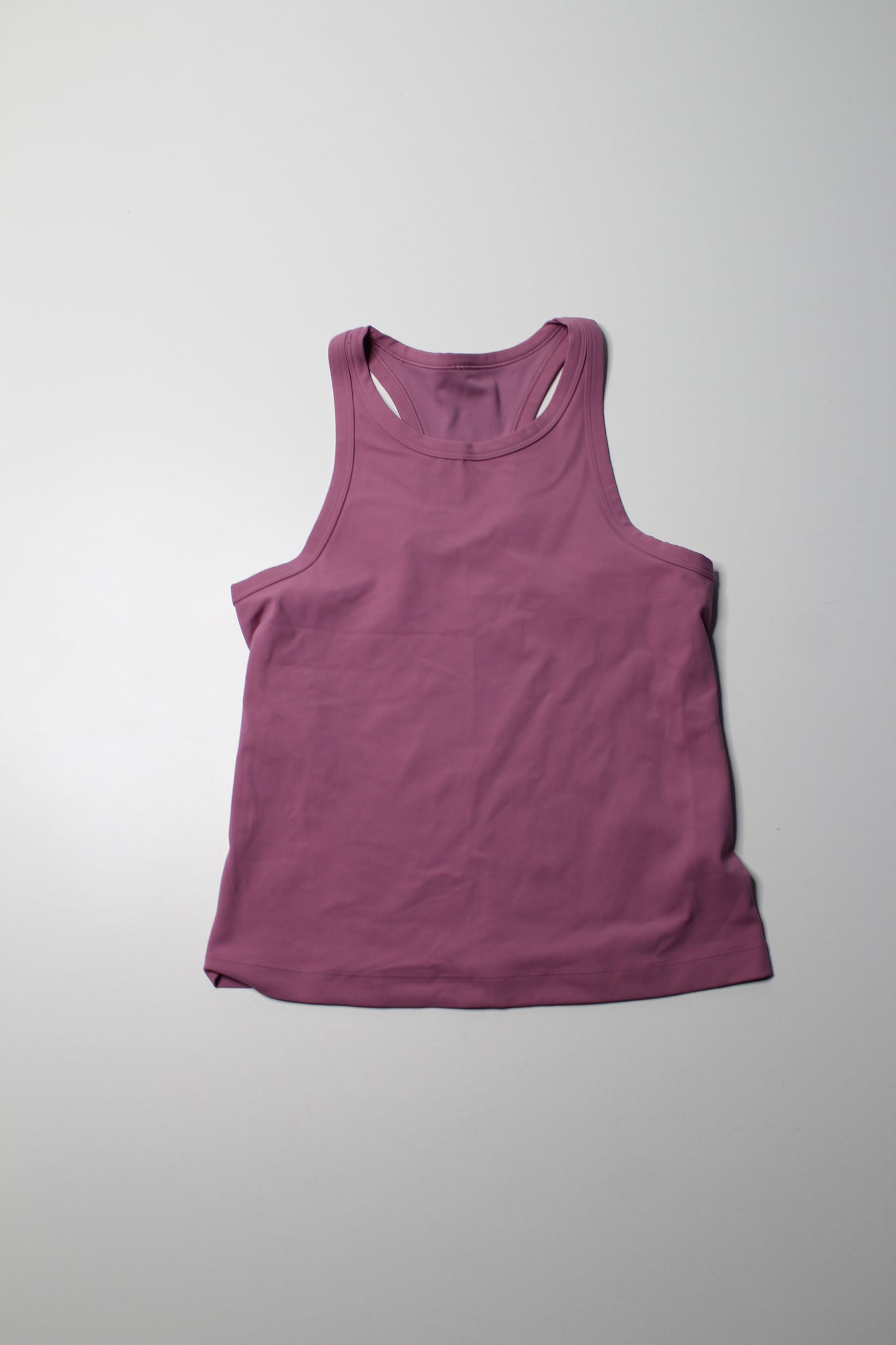 Lululemon velvet dust waist length align racerback tank, no size. Fits like 6