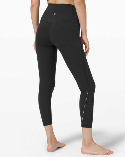 Lululemon black ‘high-rise unlimit’ tight, size 6 (25”) *keyhole