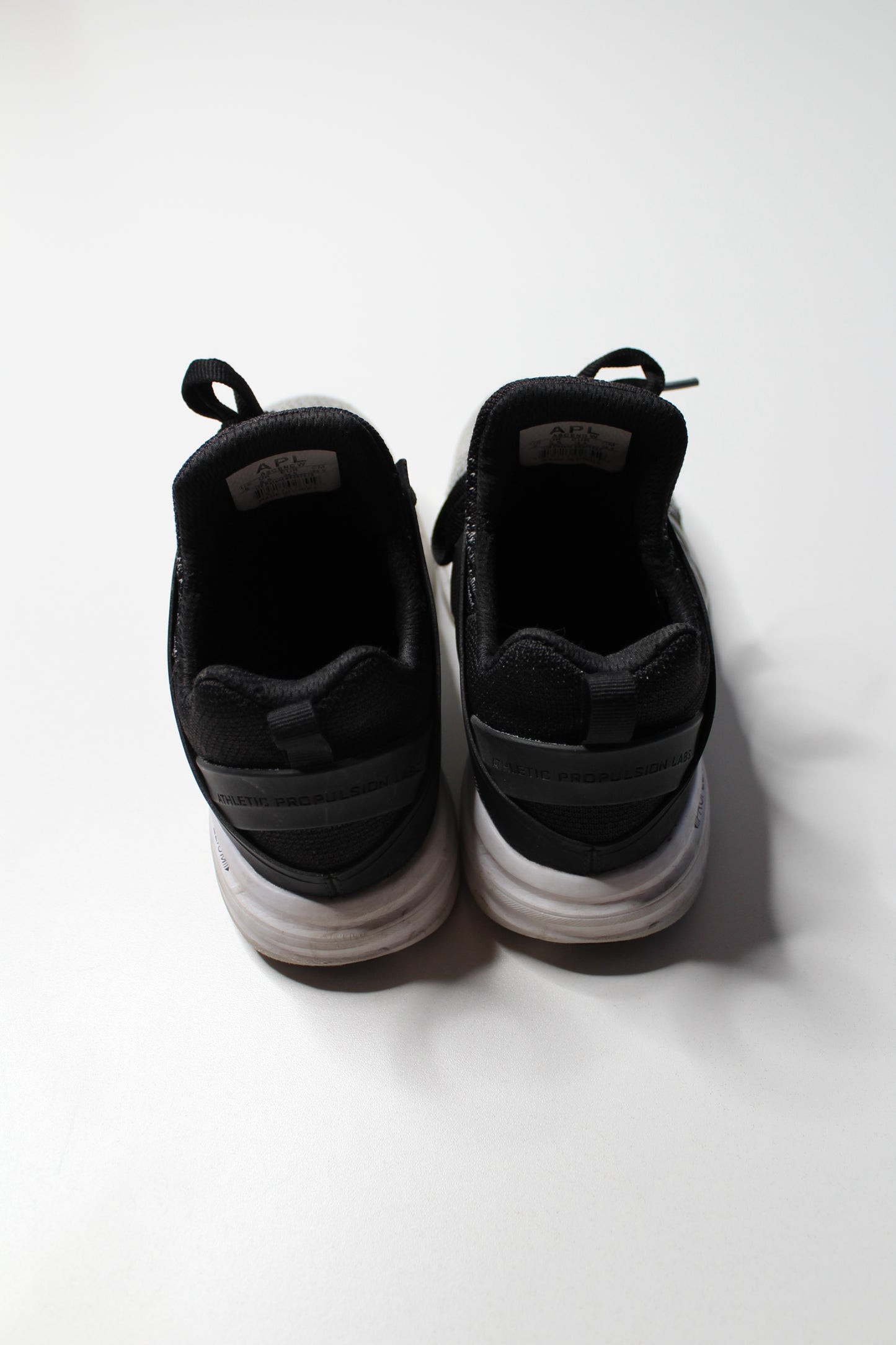 APL (Lululemon) black/white running shoe, size 8 (sale: 10% off)