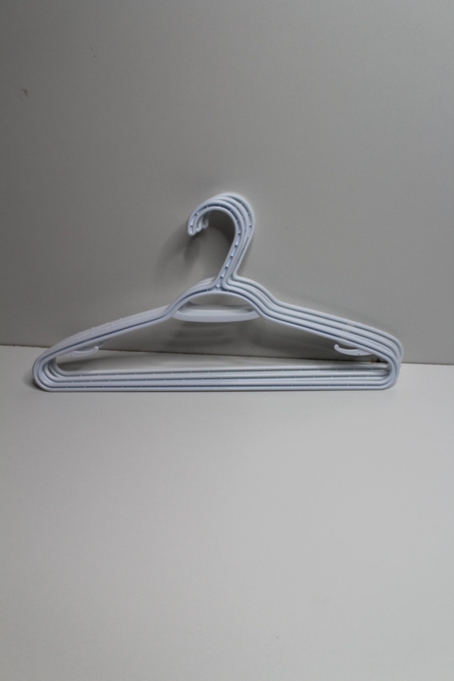Set of 90 slim neat freak white plastic clothes hangers