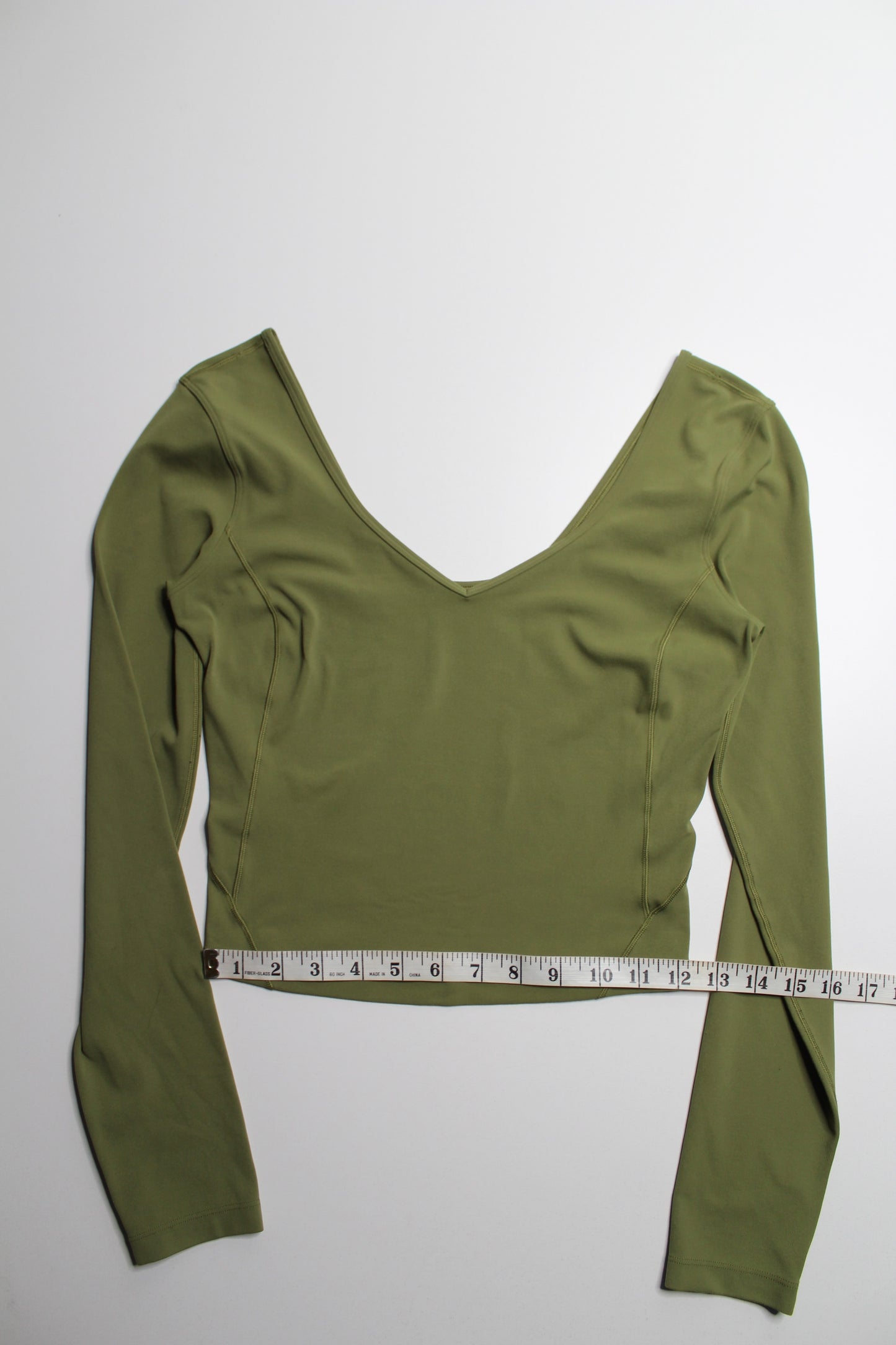 Lululemon bronze green ‘align’ v neck long sleeve, no size. Fits like 6