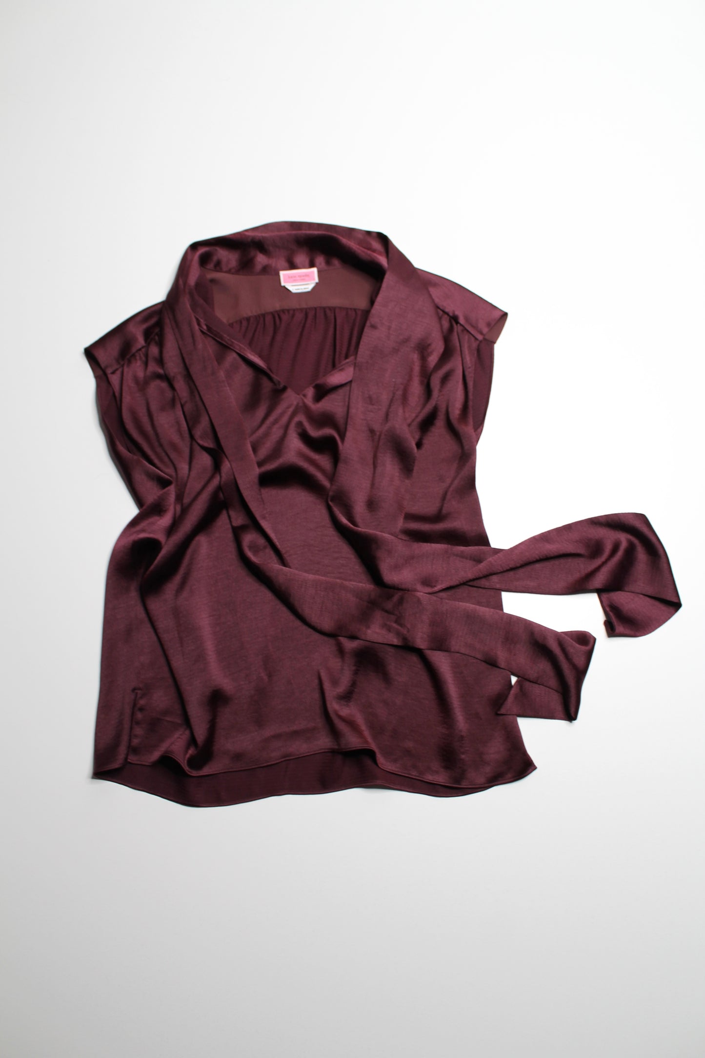 Kate Spade dark maroon bow sleeveless blouse, size small (loose fit)