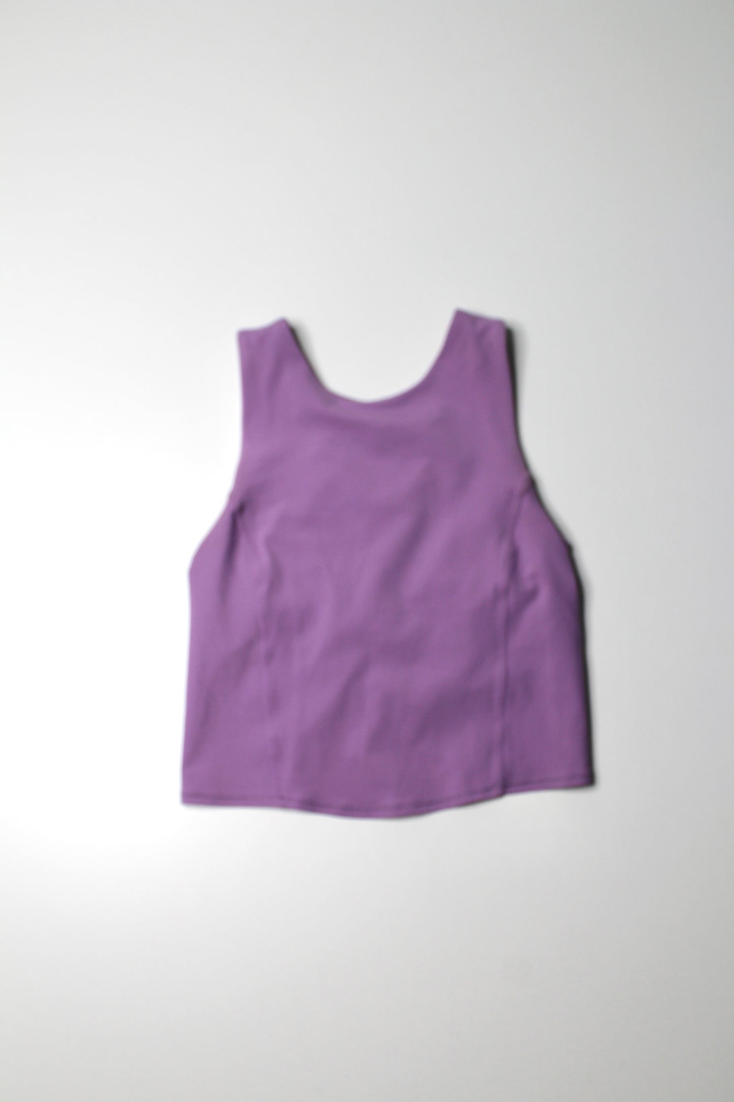 Lululemon wisteria purple ‘nulu yoga twist back’ tank, size 4 (C/D cup) (fits between 4-6)