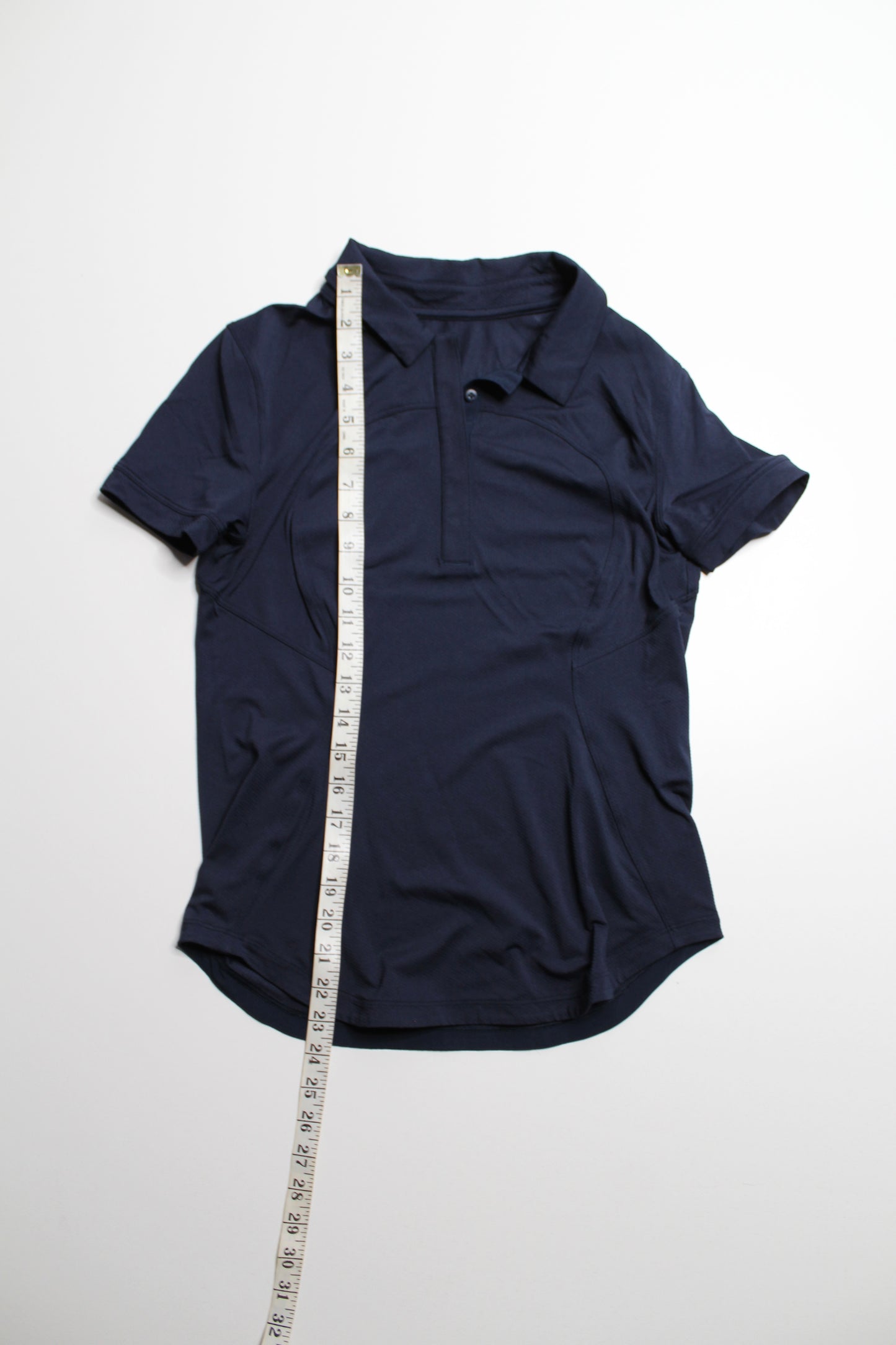 Lululemon true navy shirt sleeve golf polo, size 4 (relaxed fit)