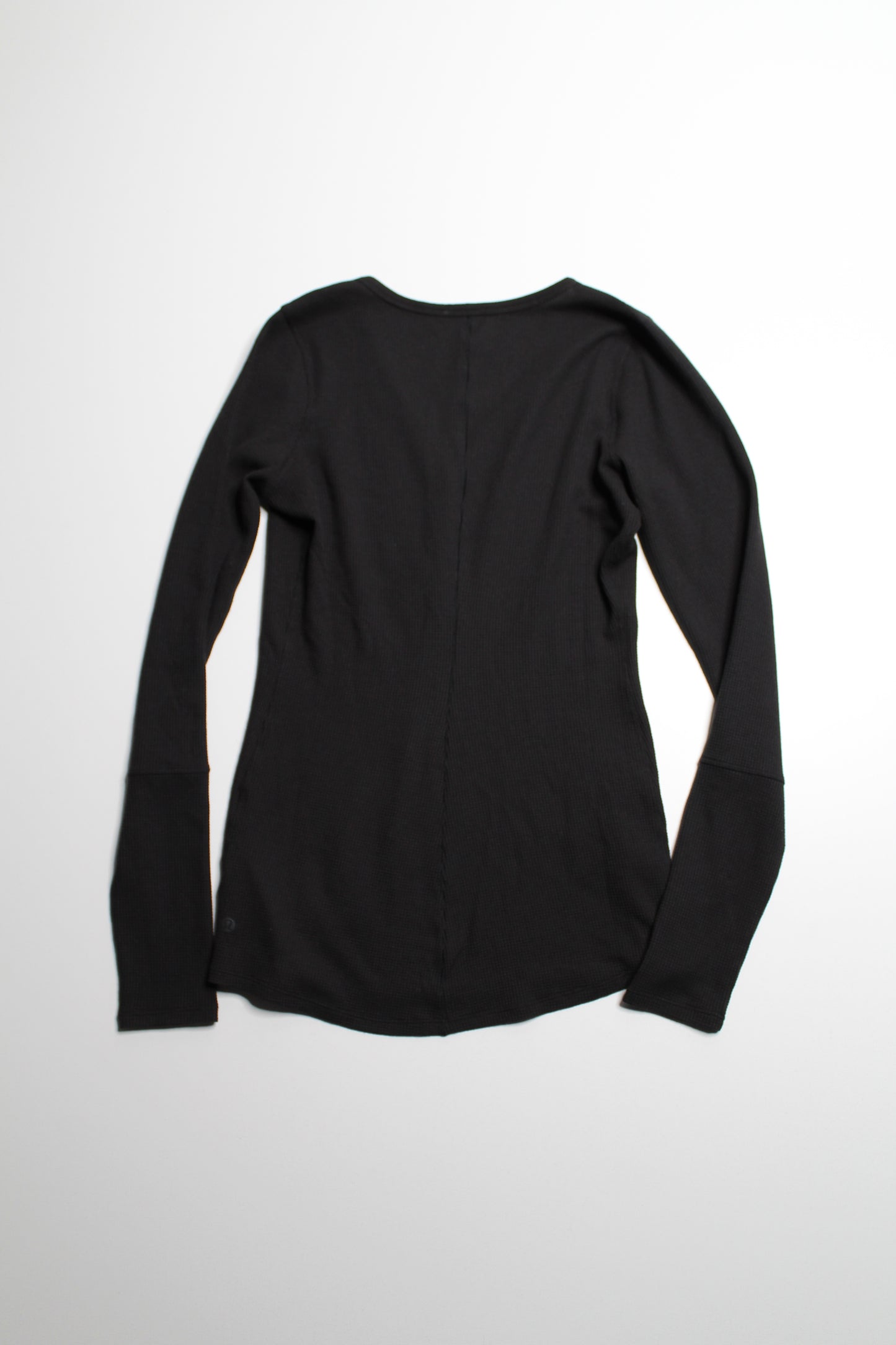 Lululemon black ‘close call’ henley long sleeve, no size. Fits like size small /size 6