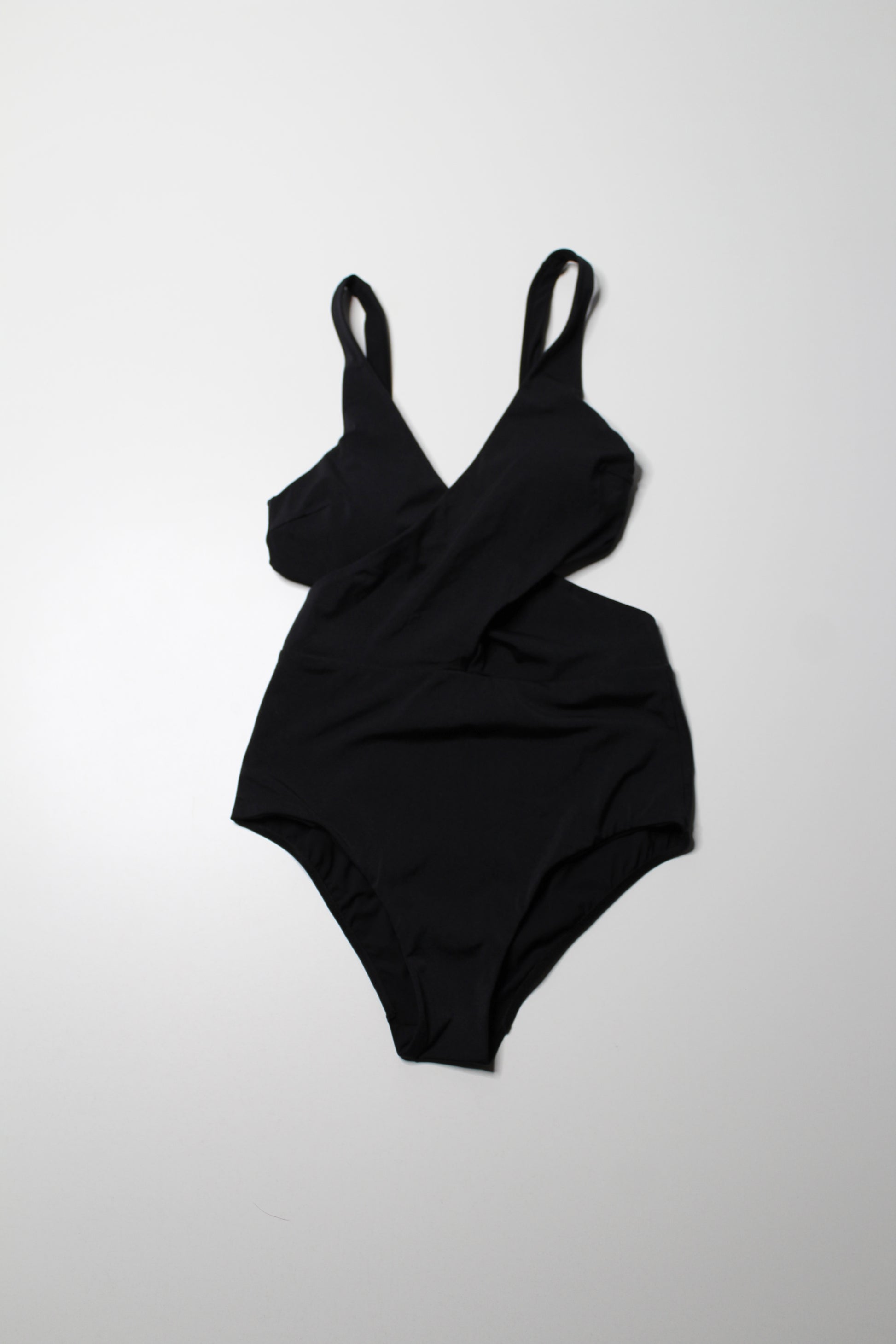 Lululemon black ‘all that glimmers wrap one piece swimsuit, no size. Fits like 8 (medium)