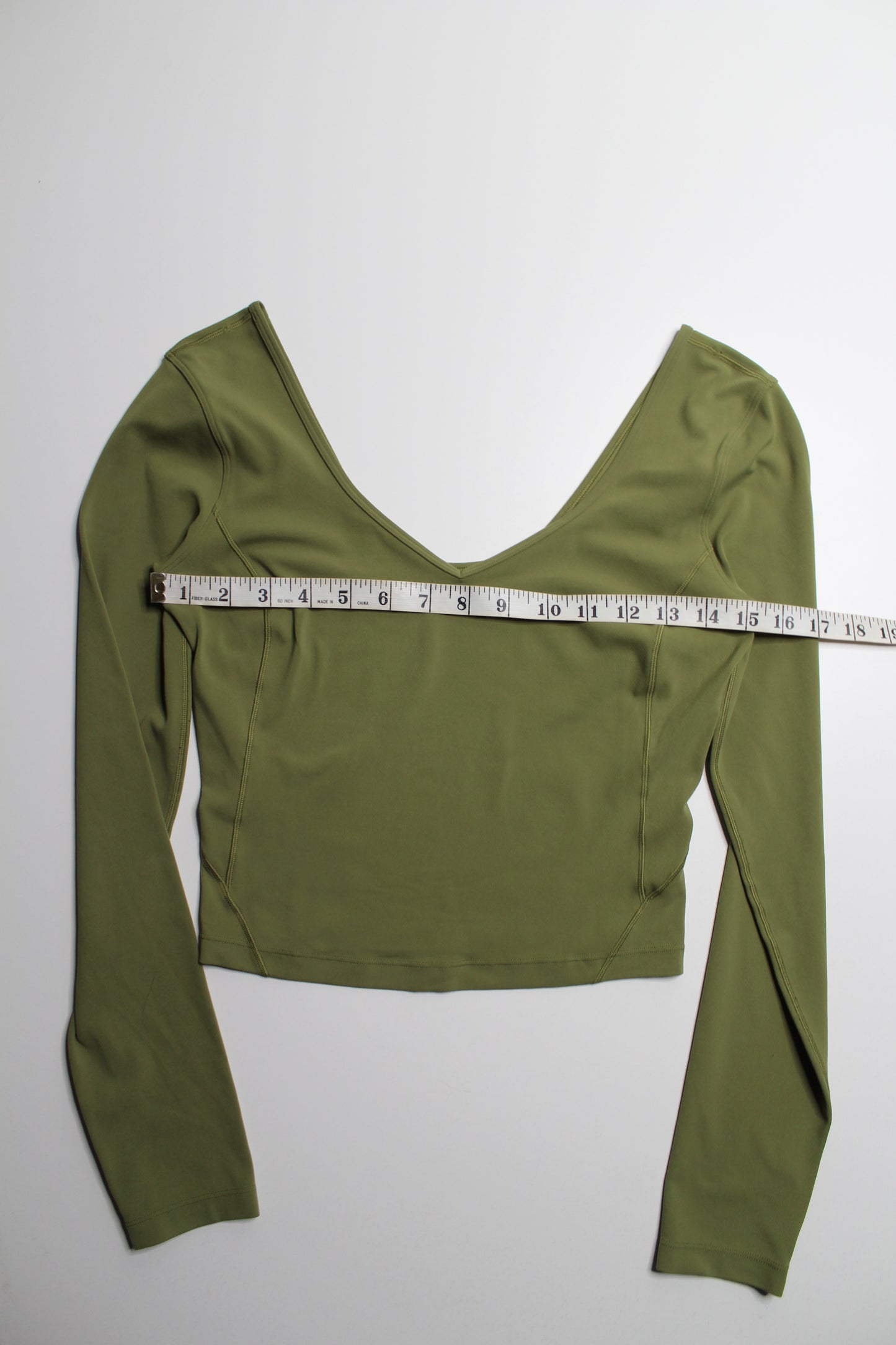 Lululemon bronze green ‘align’ v neck long sleeve, no size. Fits like 6