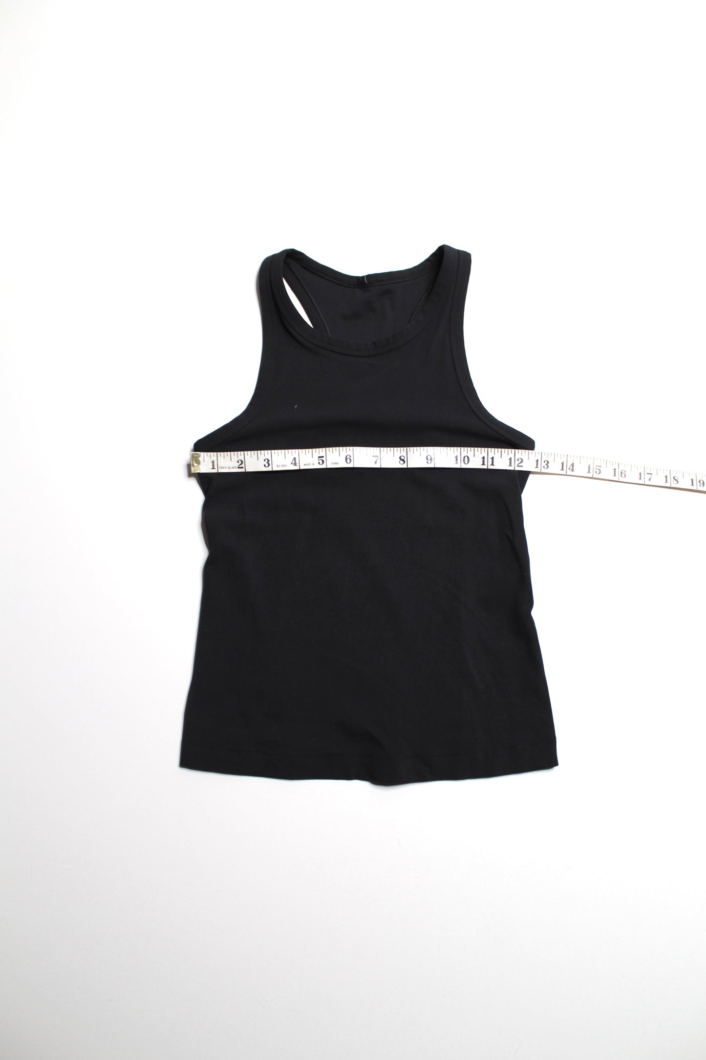 Lululemon black waist length racerback ‘align’ tank, no size. Fits like 4
