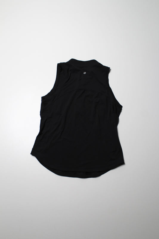 Lululemon black ‘front zip mock neck’ tennis tank, no size. Fits like 8