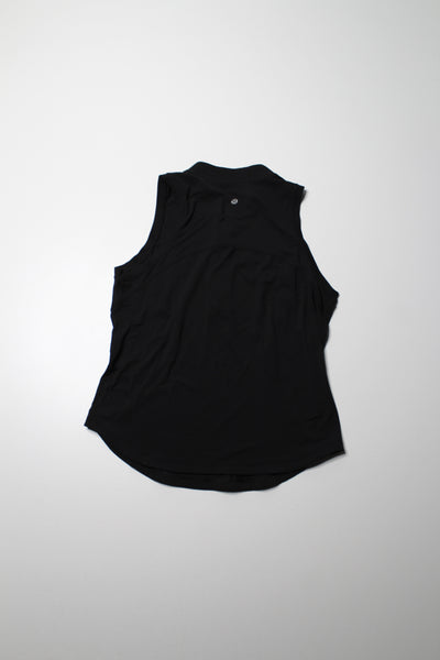 Lululemon black ‘front zip mock neck’ tennis tank, no size. Fits like 8