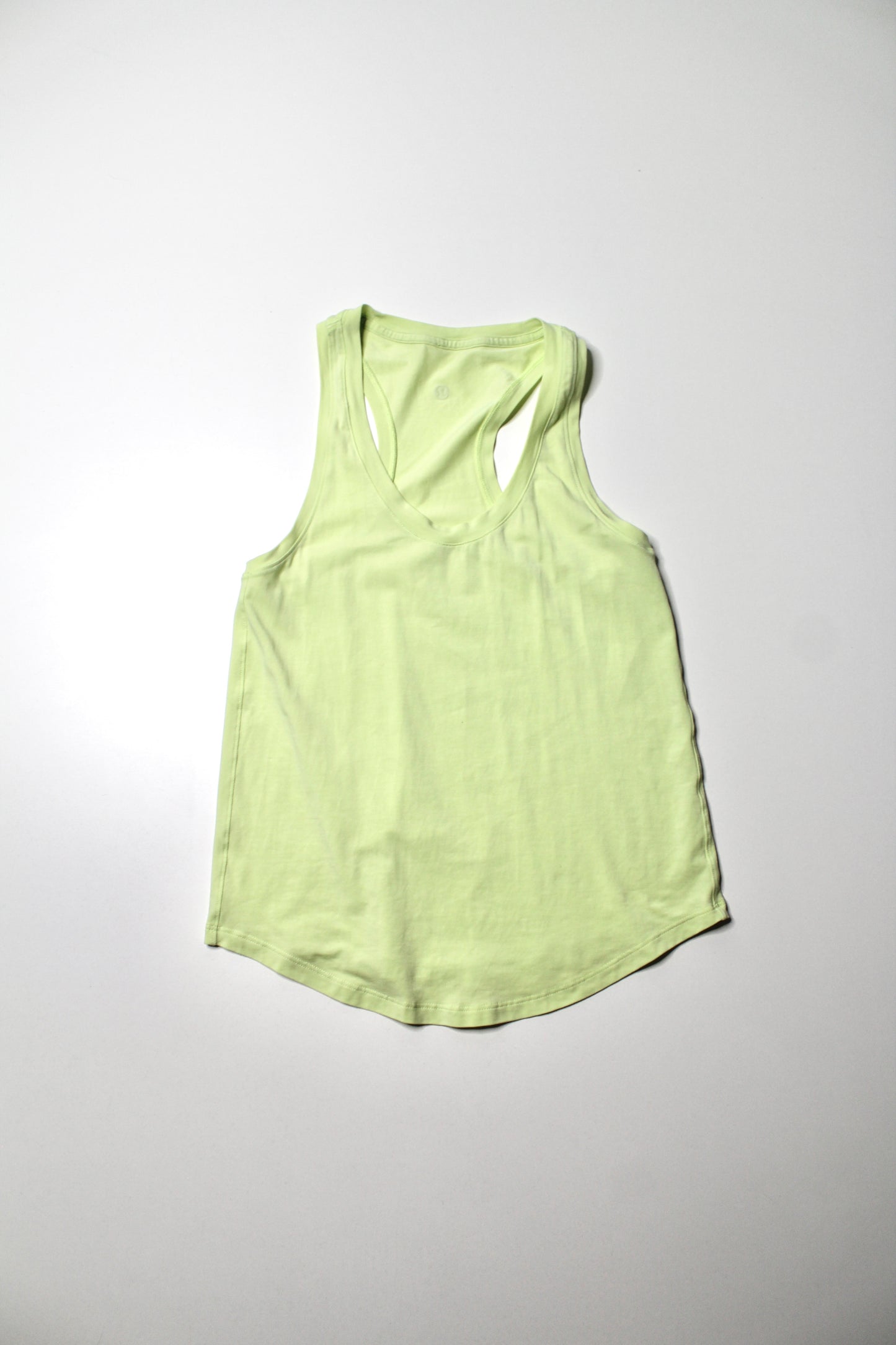 Lululemon light yellow ‘love’ tank, no size. Fits 4/6