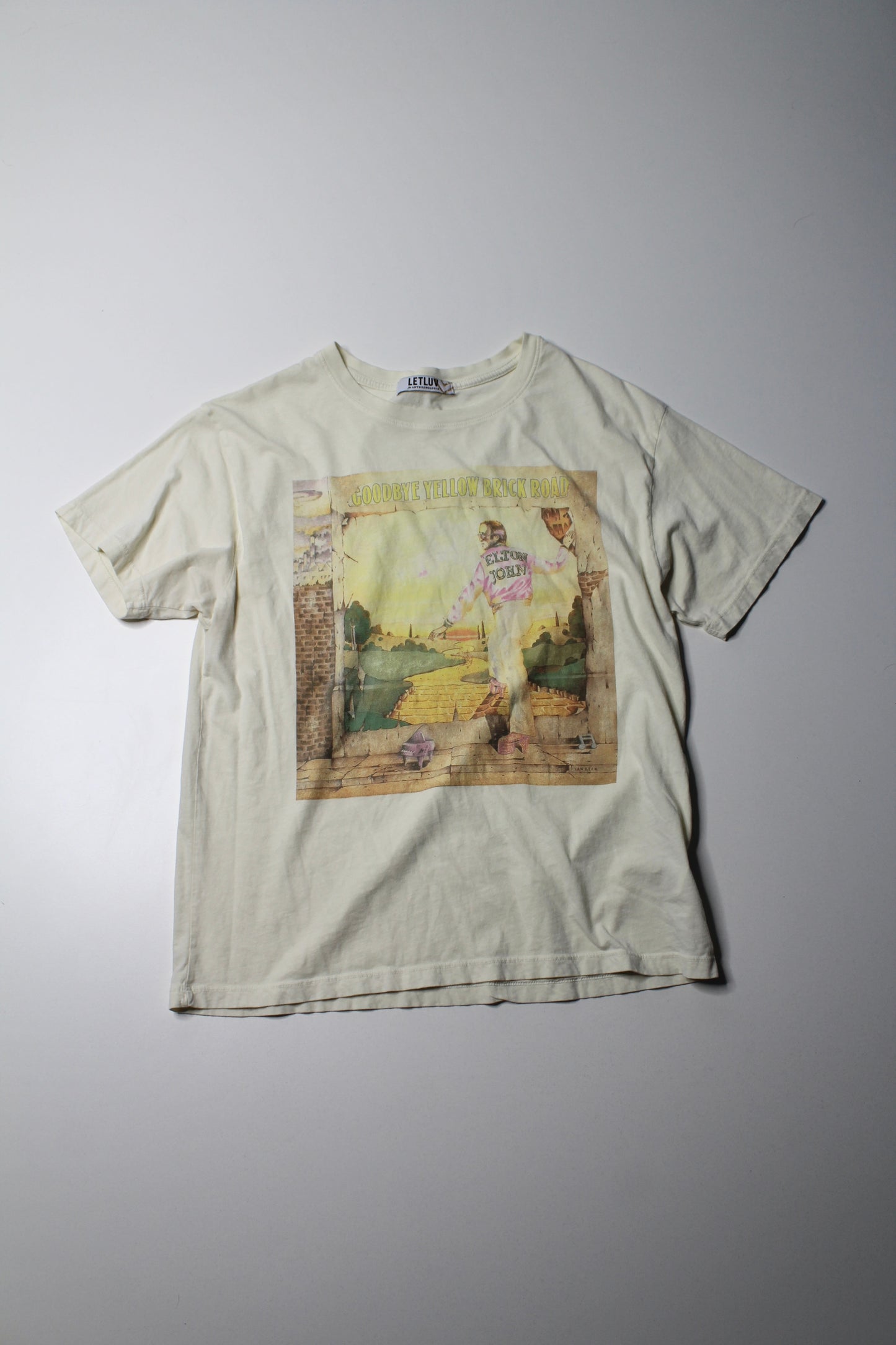 Anthropologie Letluv butter yellow Elton John ‘Goodbye Yellow Brick Road’ band tee, size small