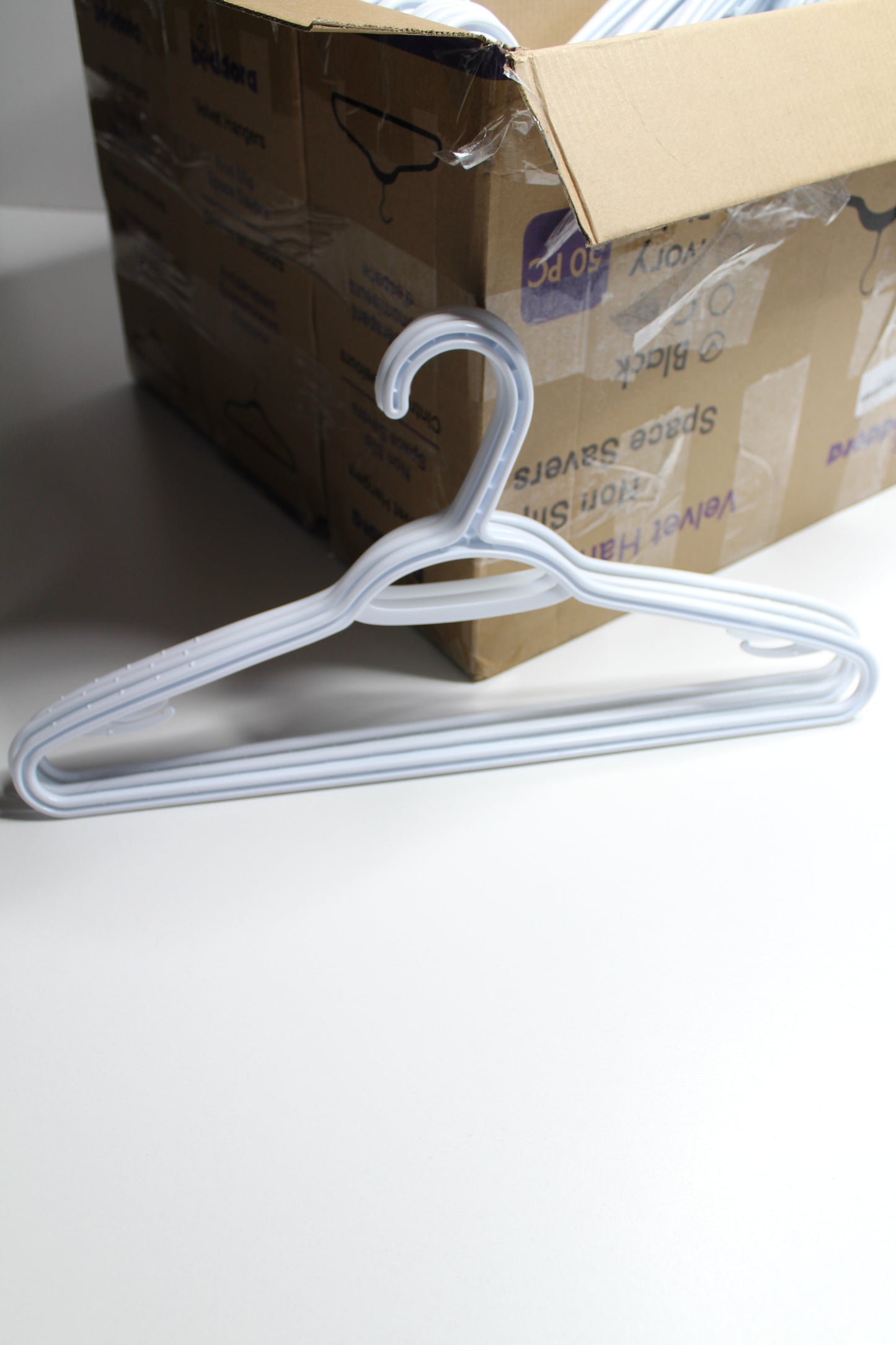 Set of 90 slim neat freak white plastic clothes hangers