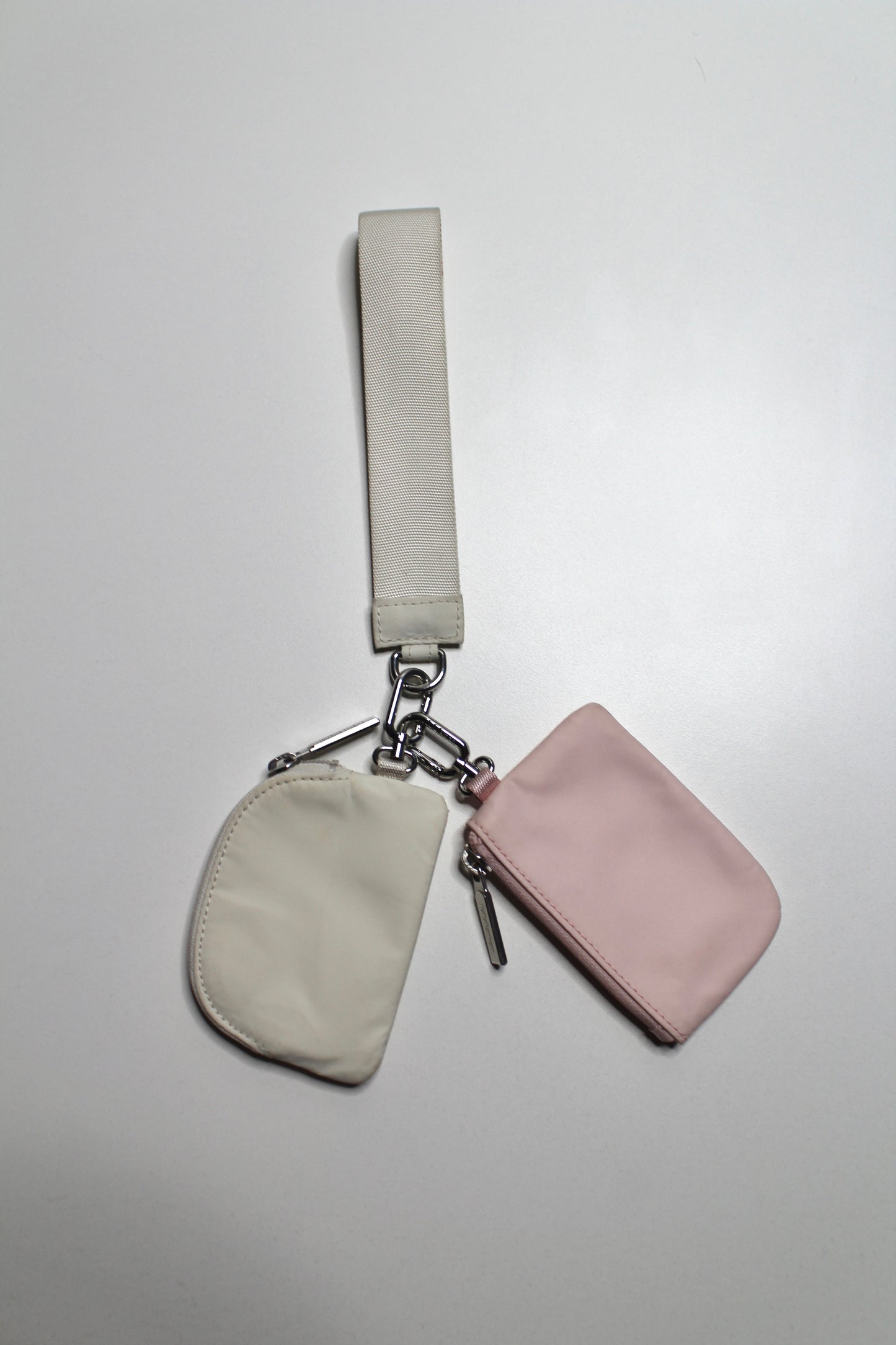 Lululemon pink/ivory ‘dual pouch’ wristlet