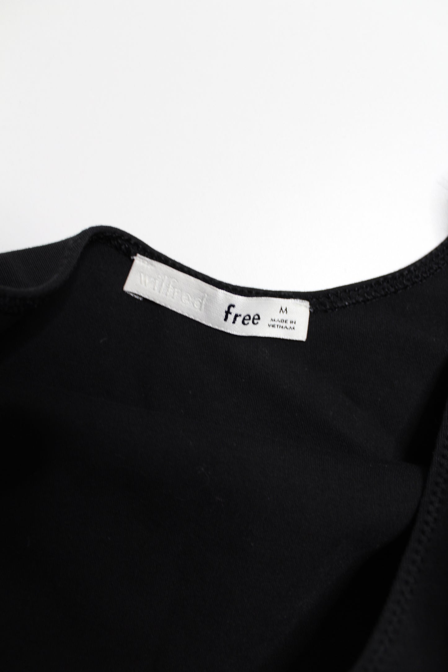 Aritzia Wilfred Free black scoop neck bodysuit, size medium